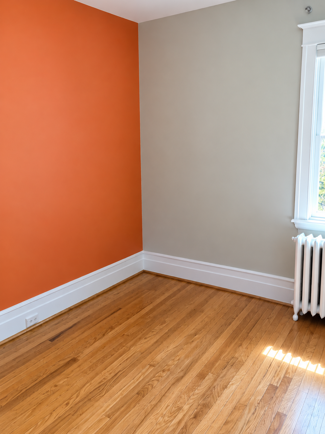 Orange painted accent wall in a residential room