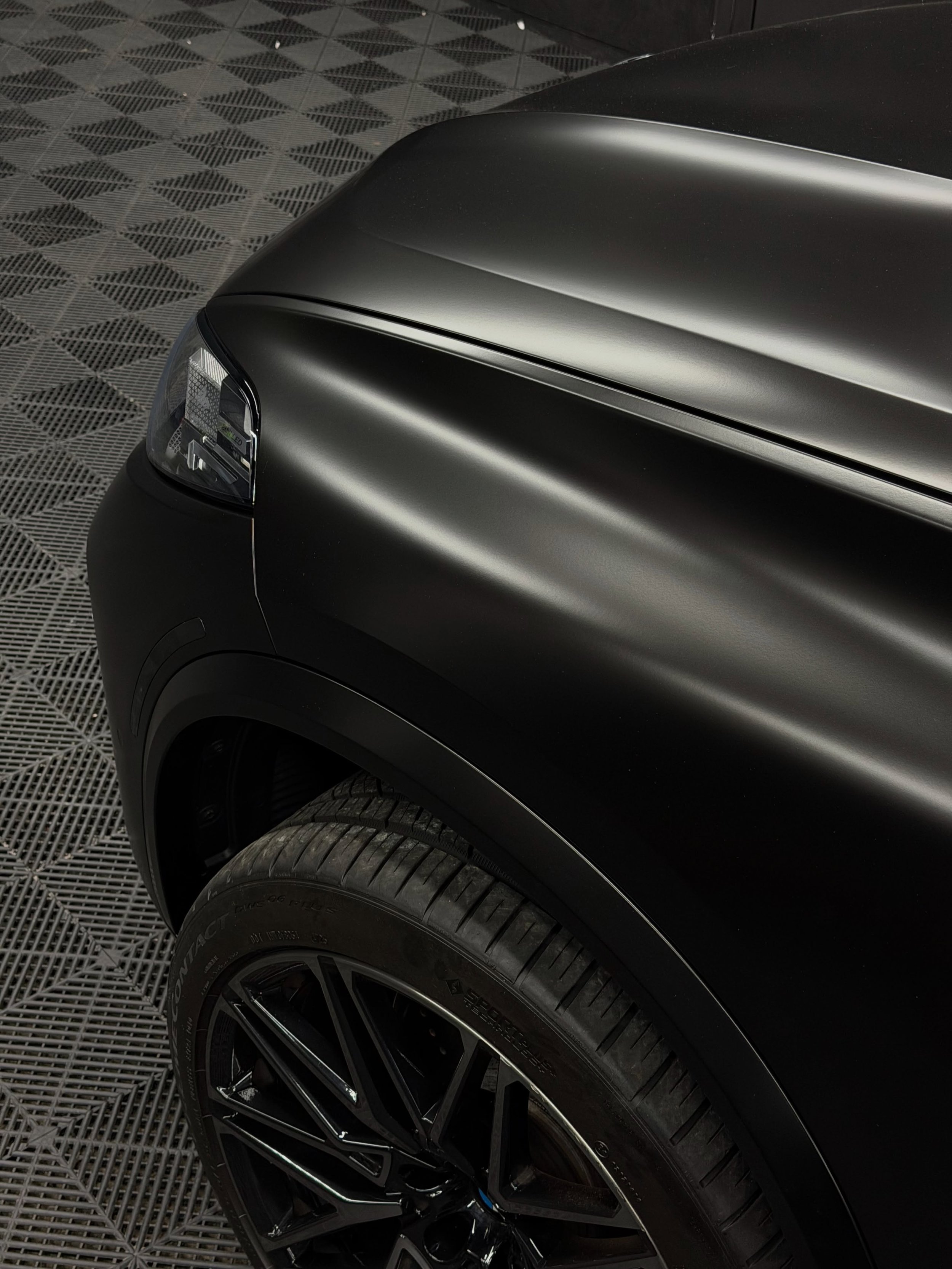 This BMW X5 M got a complete transformation in KPMF Satin Perfect Black. We wrapped the exterior and all door jambs for a consistent finish every time the doors open, then applied a ceramic coating over the wrap for easier maintenance and a rich sati