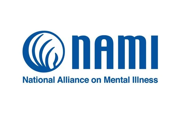 The logo of NAMI, the National Alliance on Mental Illness, featuring a stylized blue emblem with curved lines next to the organization's name and full name.