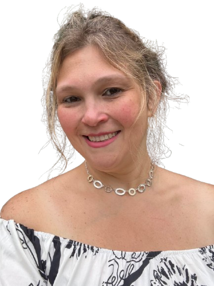 A woman with blonde hair wearing an off-the-shoulder top with a black and white pattern and a silver necklace, smiling at the camera.