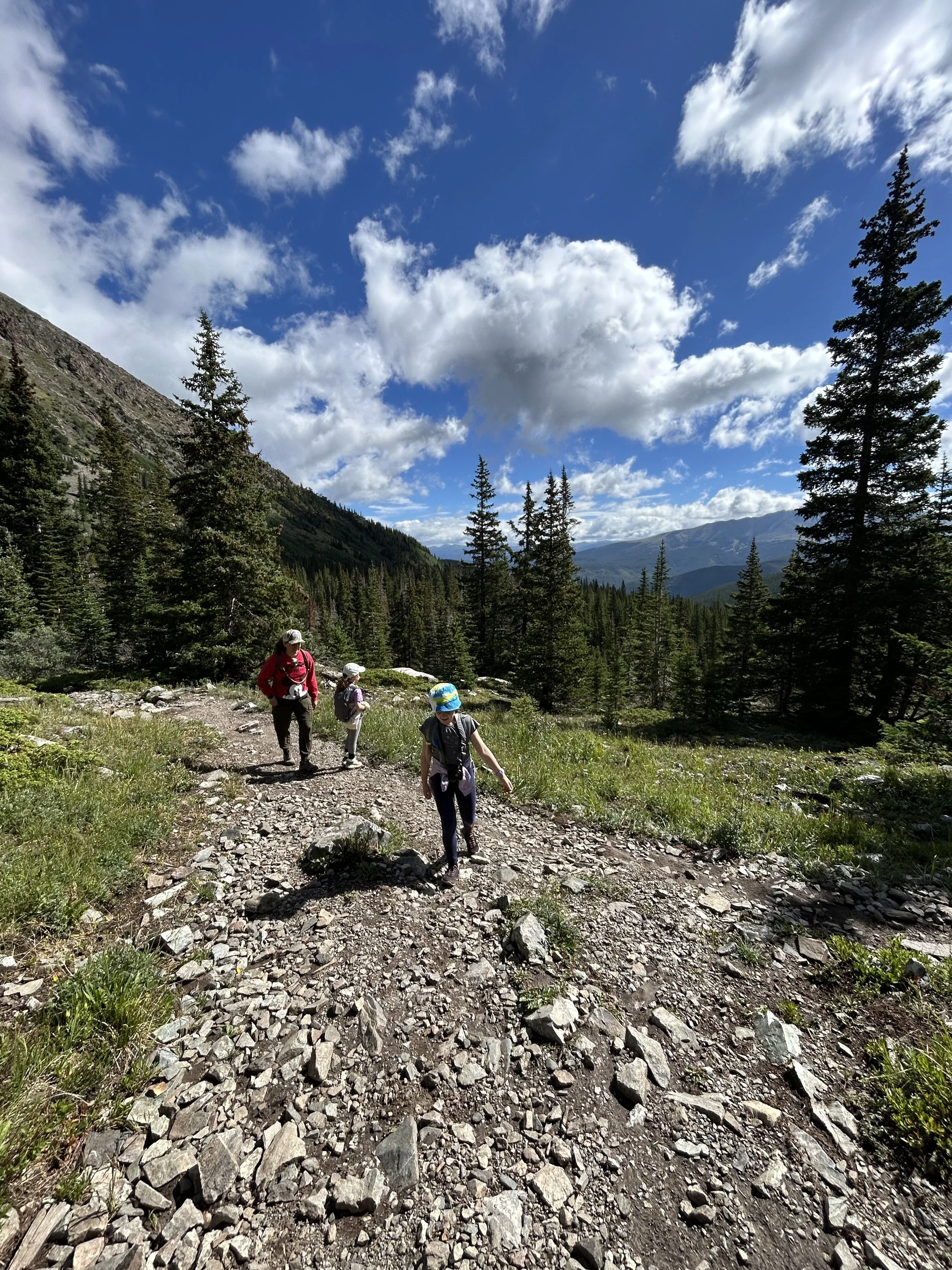 Stephanie on a hike with her two kids