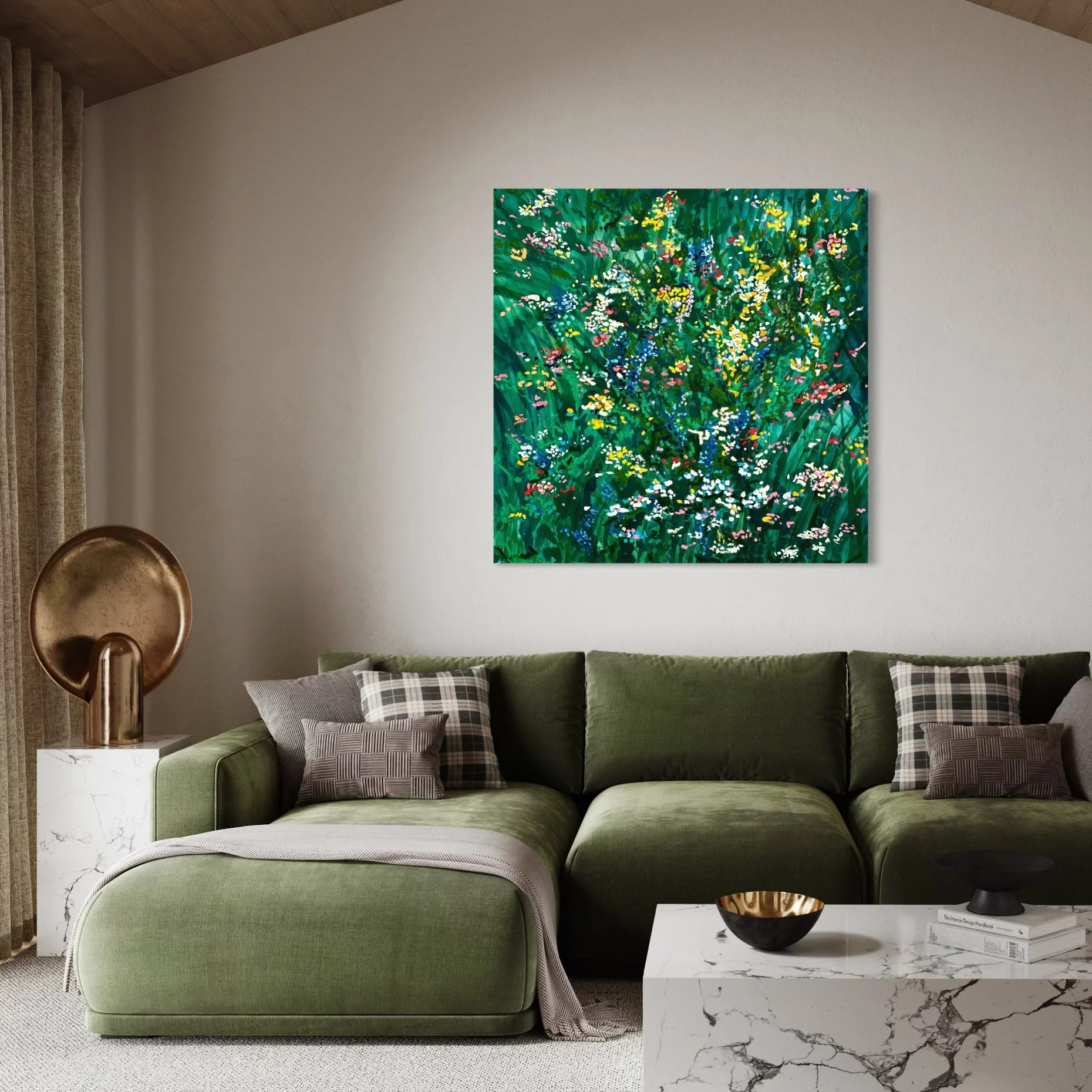 Living room with green sectional sofa decorated with plaid throw pillows, marble coffee table with black bowl and books, abstract floral painting on the wall, brass lamp on marble side table, beige curtains, and neutral carpet.