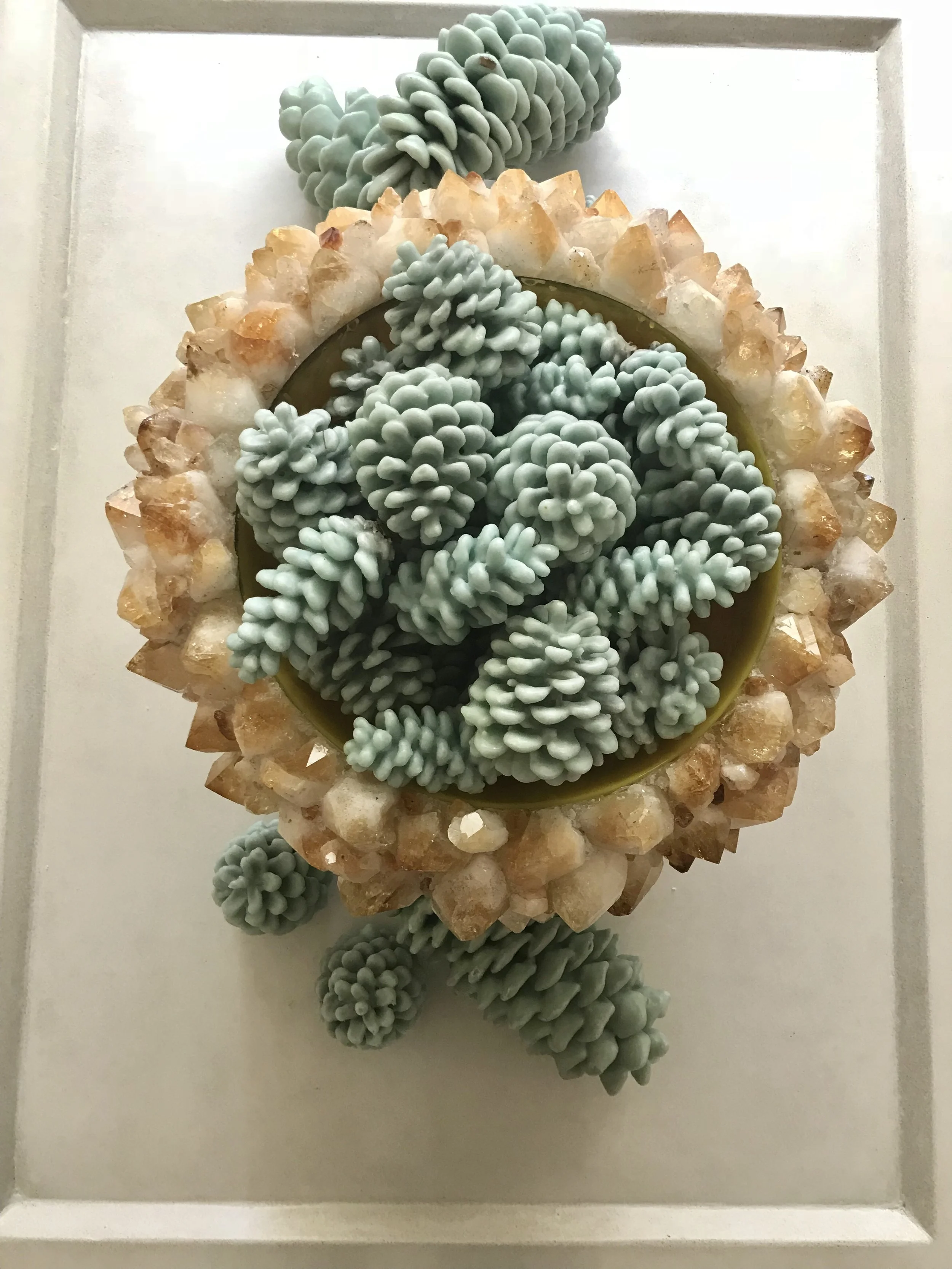 Playing with pine cones this morning. These are one of my all time favorite holiday hacks. The citrine bowl which weighs as much as me is a grounding force on this blustery day.