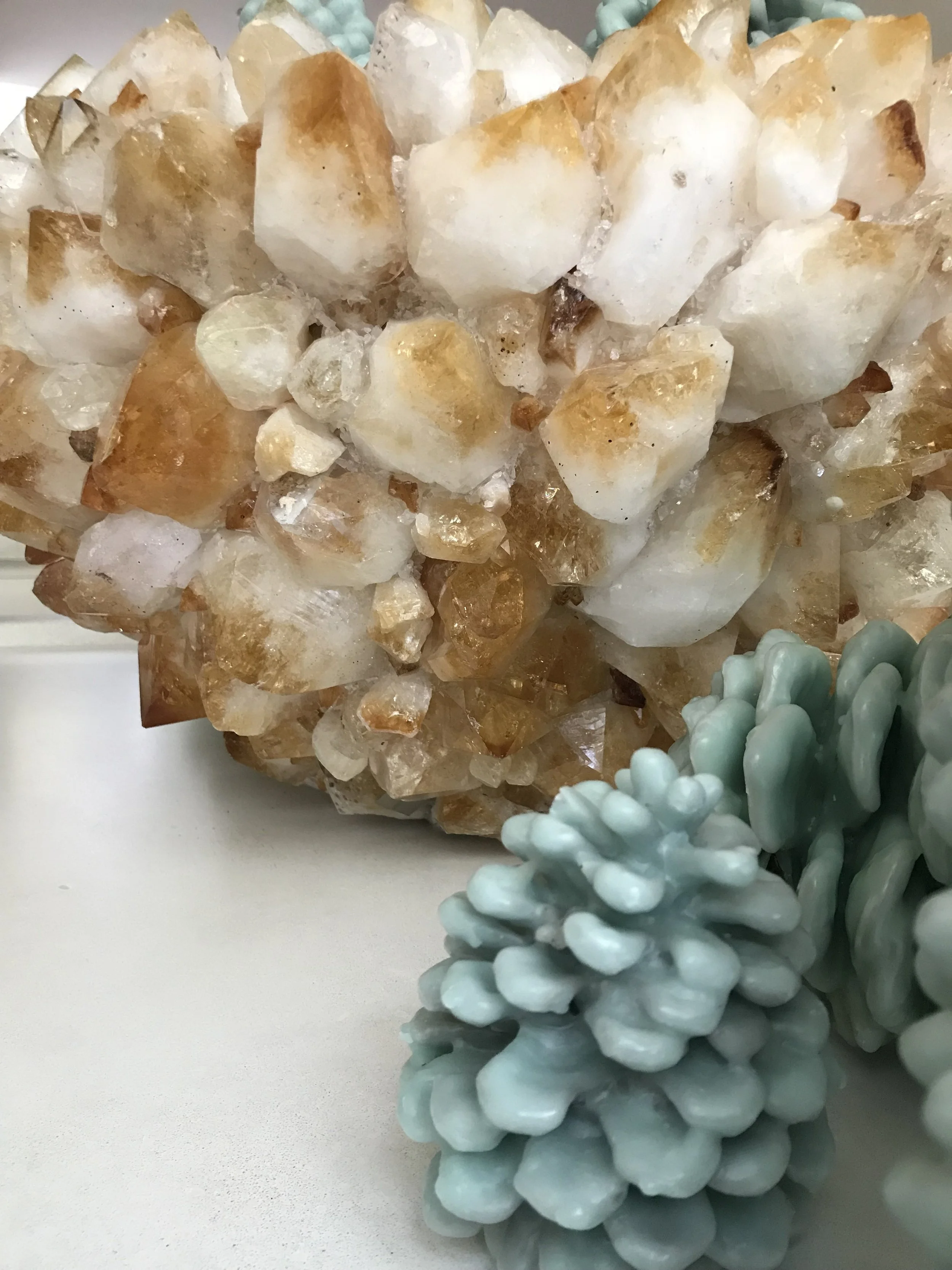 SCW Interiors Life Hacks Blog Post : The Healing Power of Crystals. This citrine bowl takes pride of place in my living room and the scented pine cones are a soft touch for the Season.