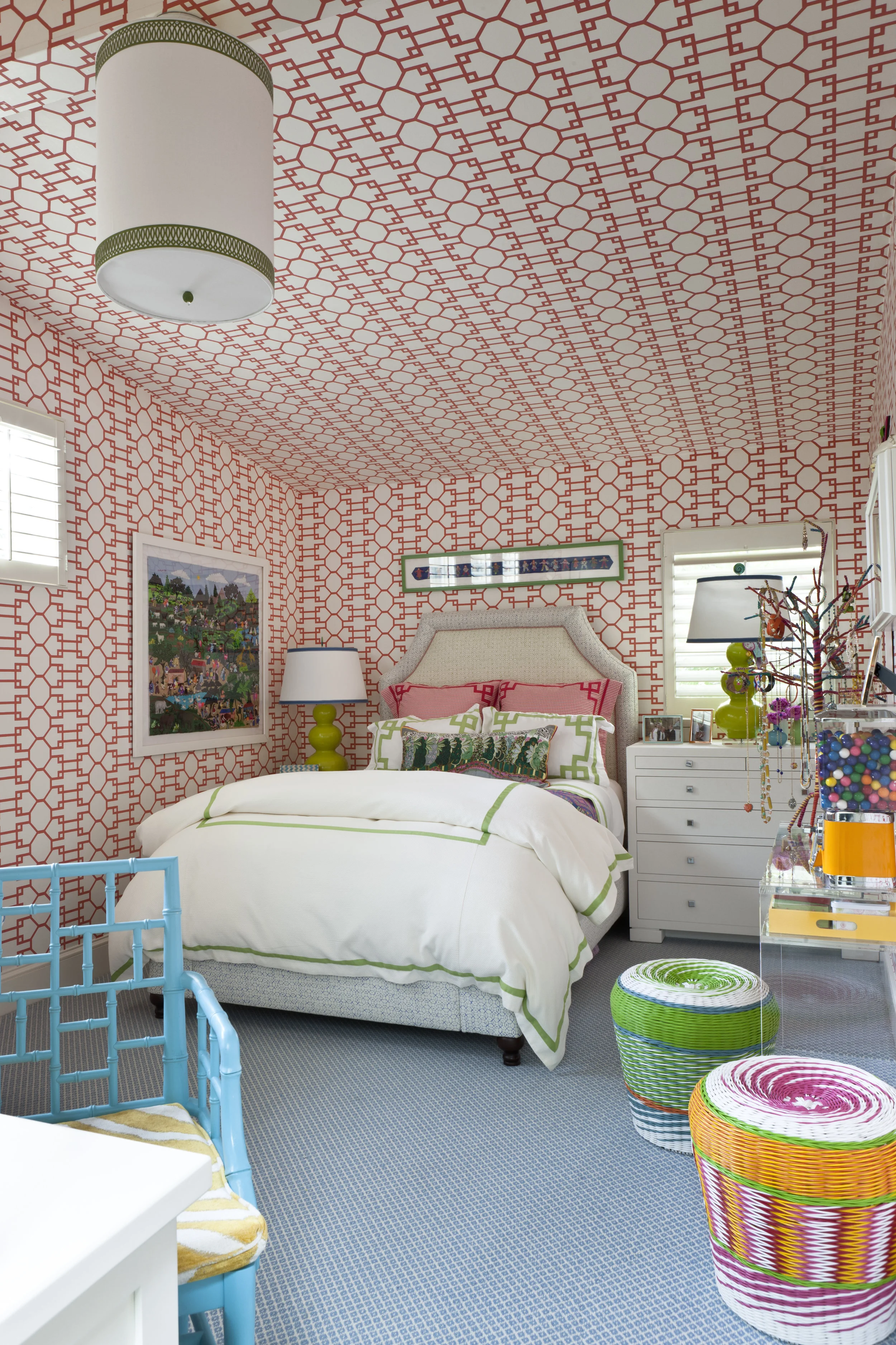 Cool coral geometrics lay the foundation for this young bedroom.