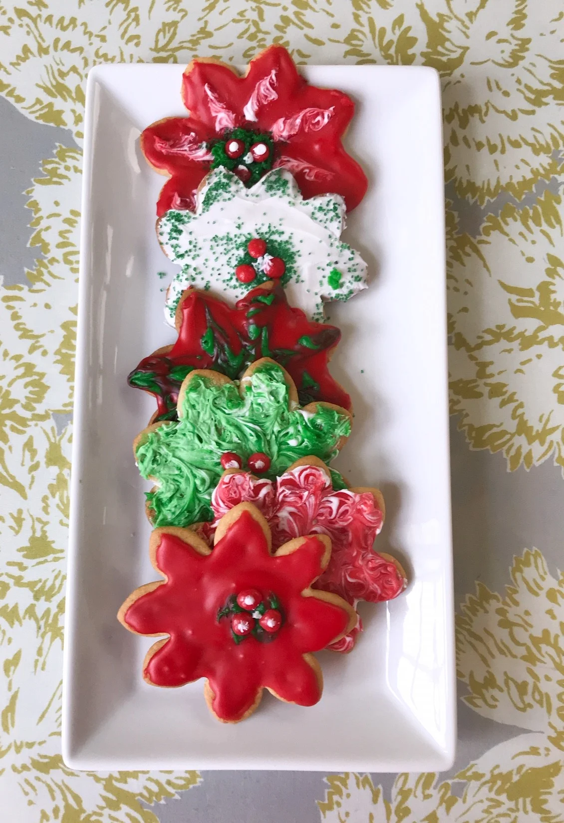 SCW Interiors Life Hacks Blog Post : Poinsettias. A Christmas tradition of mine is to make rolled sugar cookies with my poinsettia cookie cutters. See my favorite recipe from Joy of Cooking.