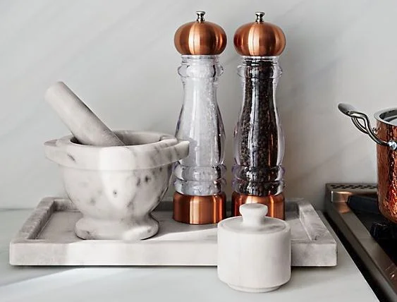 A similar marble tray can be found at Crate &amp; Barrel.
