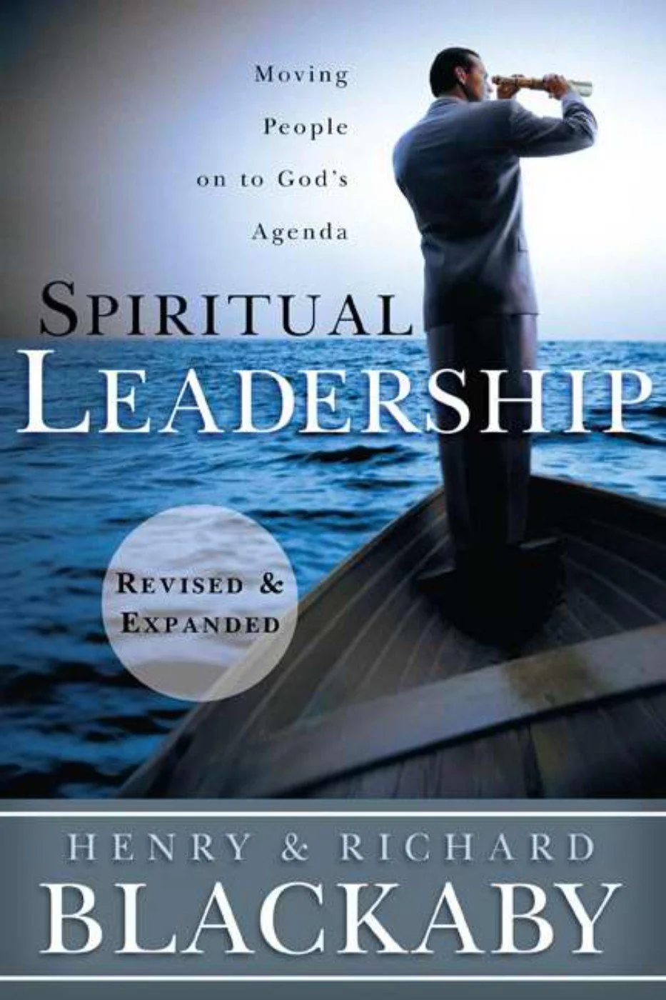 Book cover titled 'Spiritual Leadership: Moving People on to God's Agenda,' by Henry and Richard Blackaby, featuring a man in a suit on a boat with a telescope looking over the water.