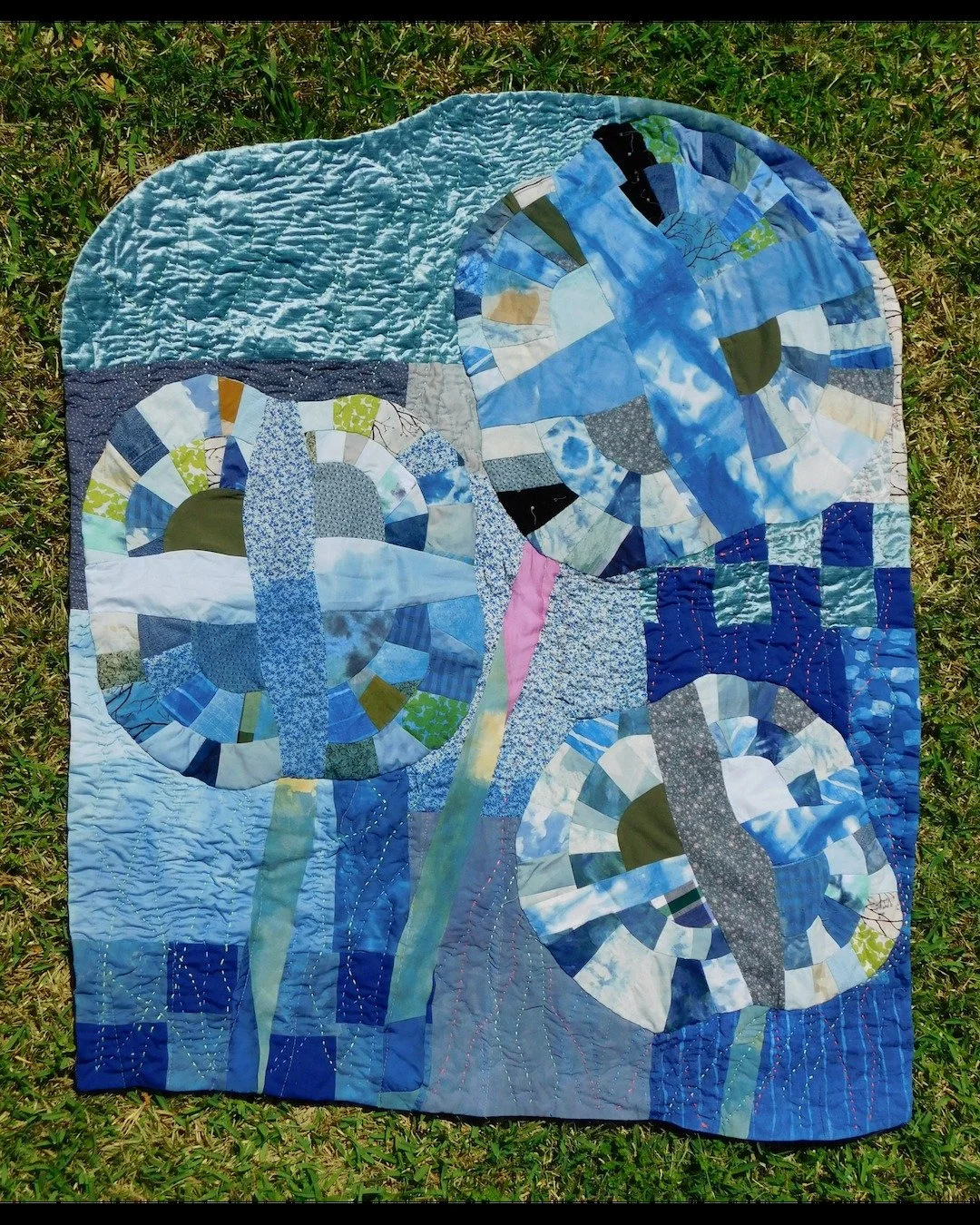 Summer is back and seasonal depression has been swept away with the spring clean. I haven't posted in some time but am fixing to change that! Here is a project I finished quilting some time ago, but was finally able to take some great pictures of. Re