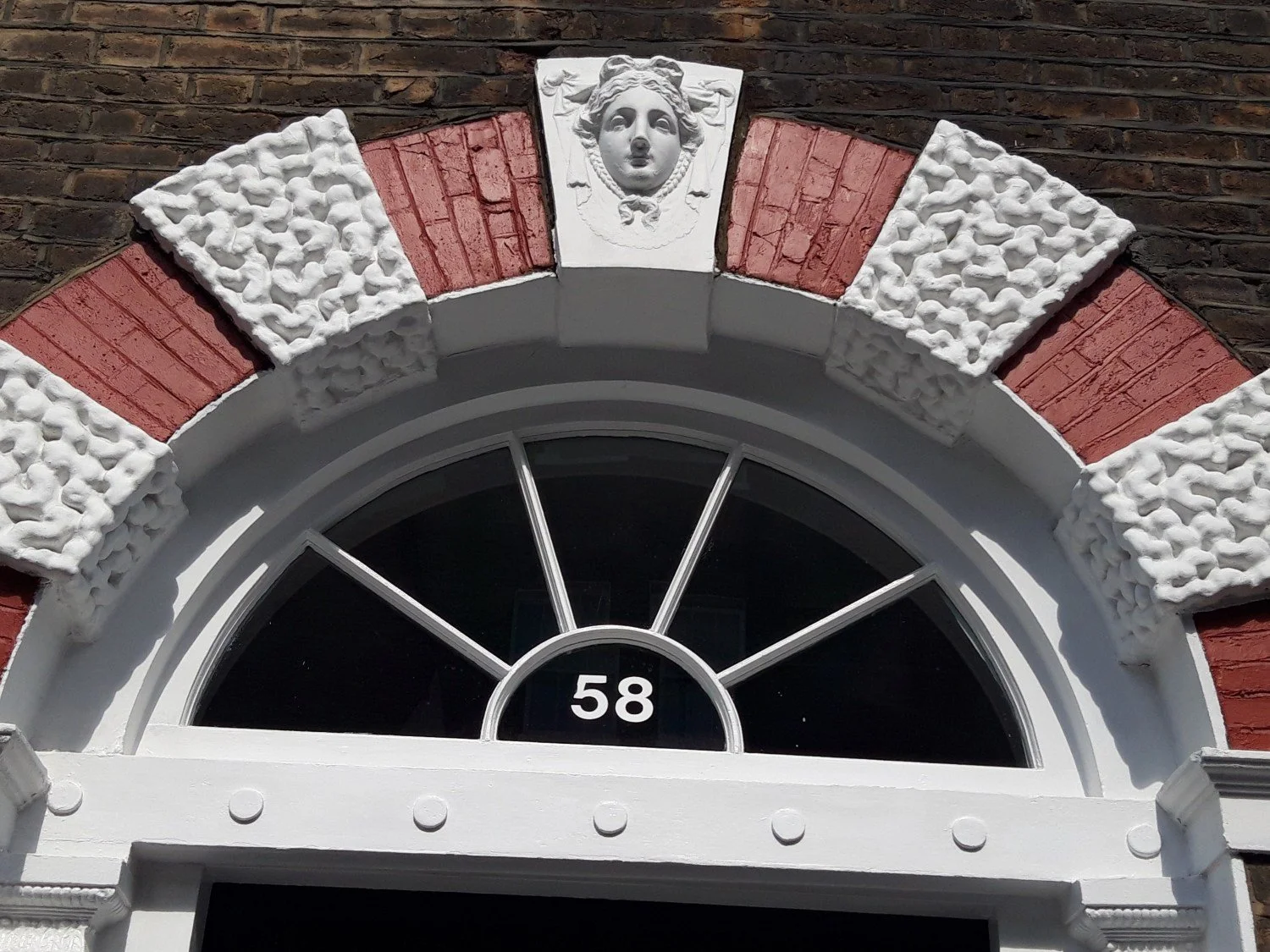 Coade stone keystone