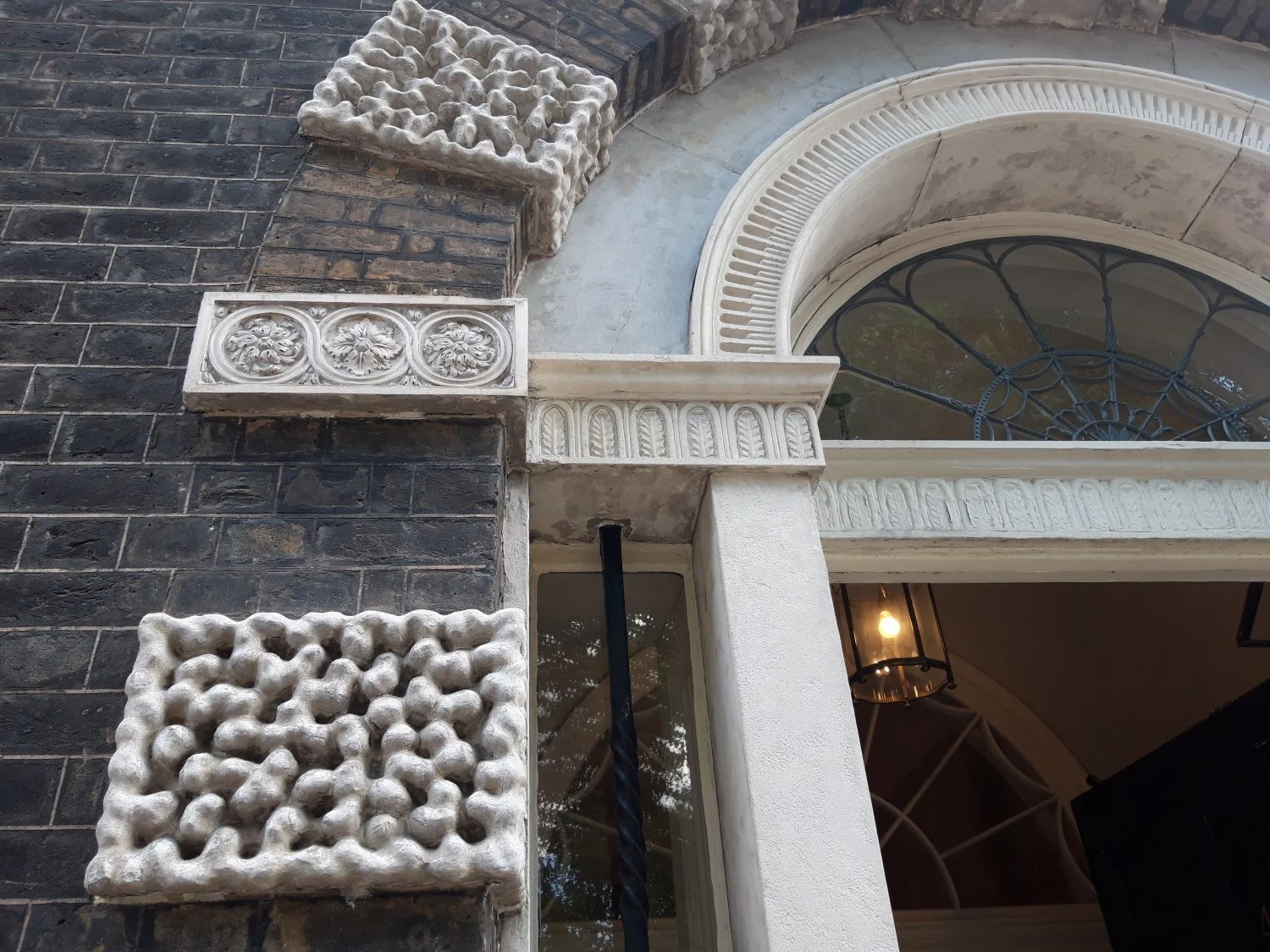 A Coade stone doorway in Bloomsbury.