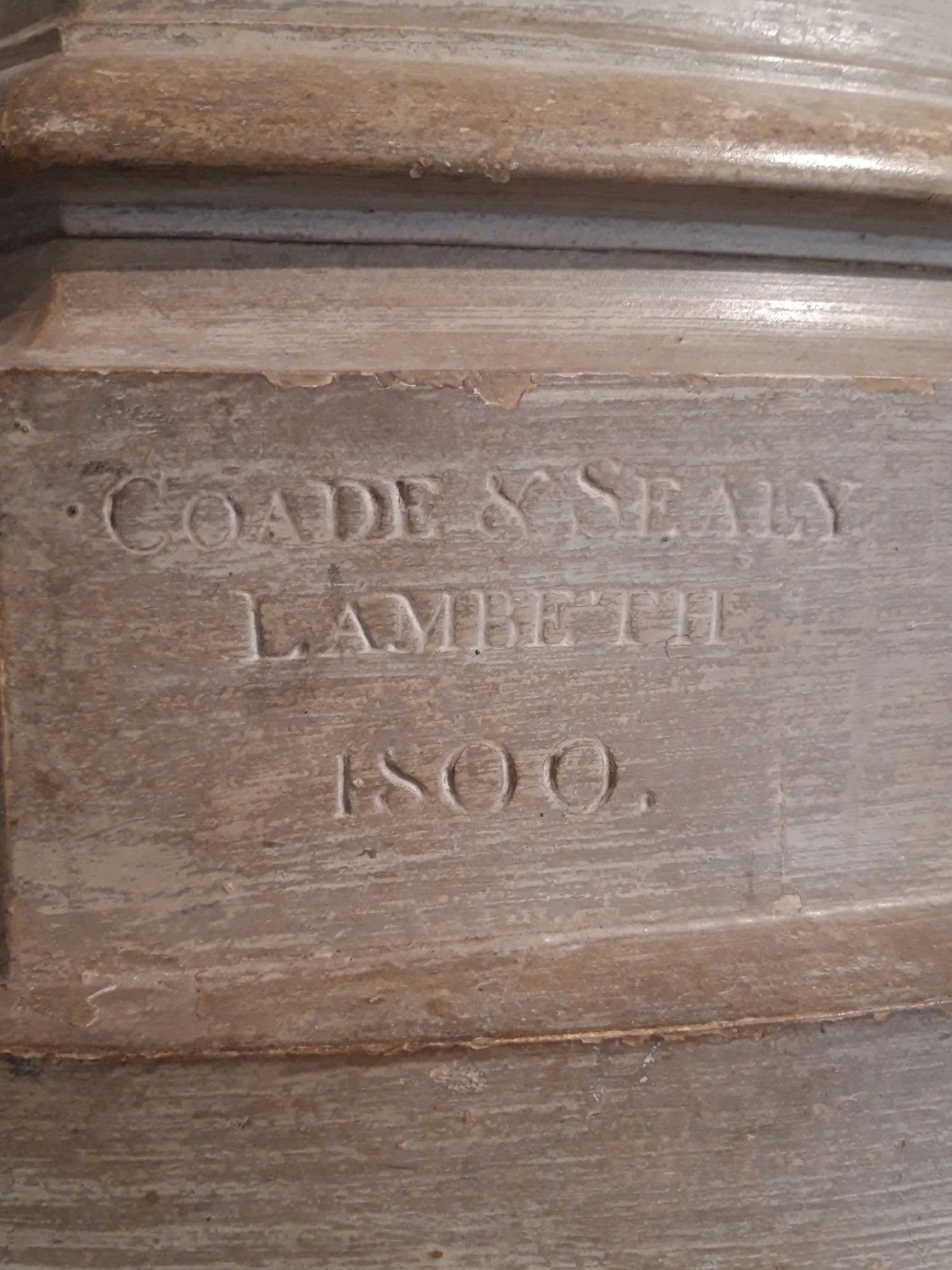 Coade's stamp on a statue in the V&A Museum.