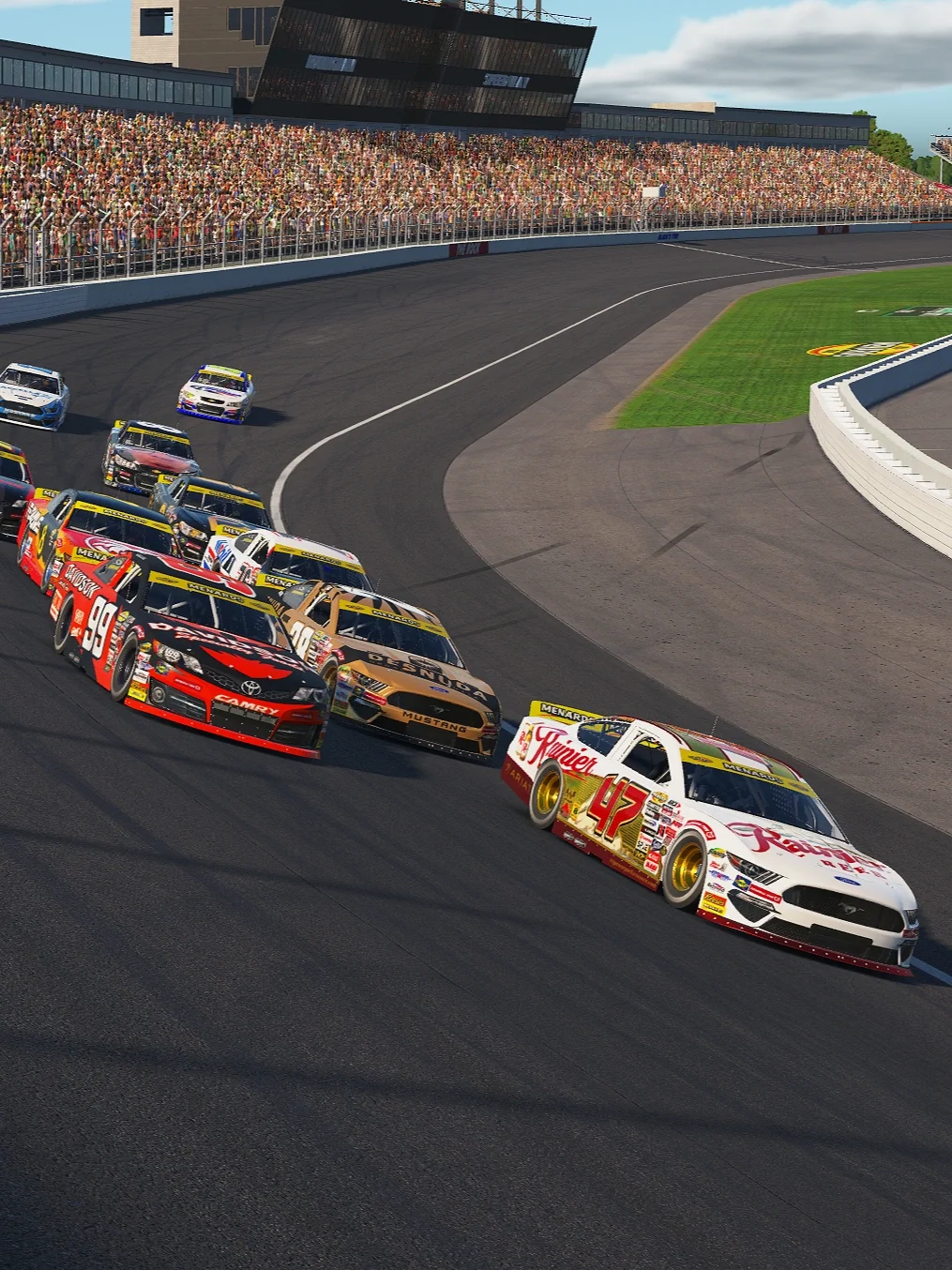 A group of race cars competing on a racetrack, with a crowd of spectators in the grandstands and a modern building in the background.