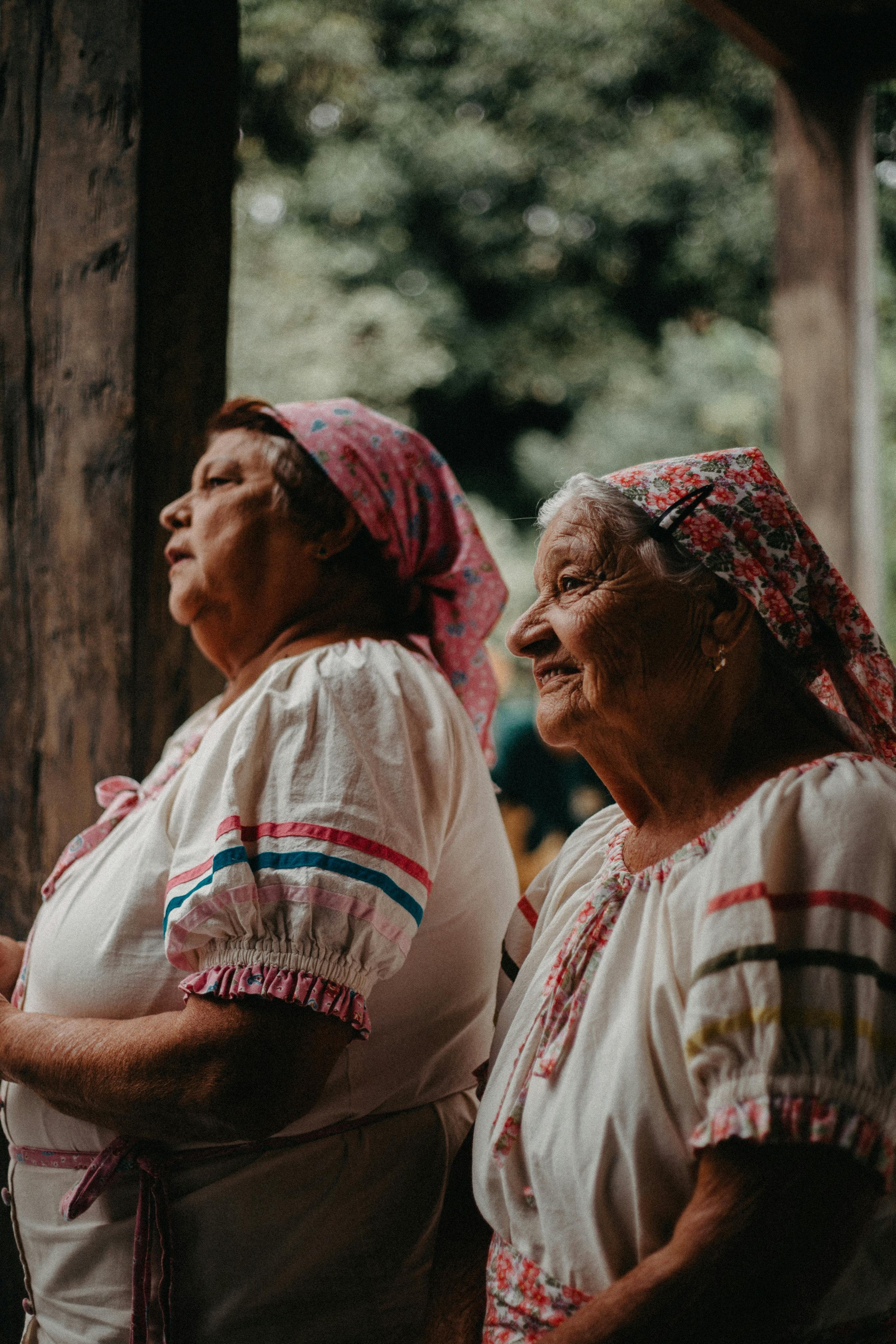 Two older women looking into the distance