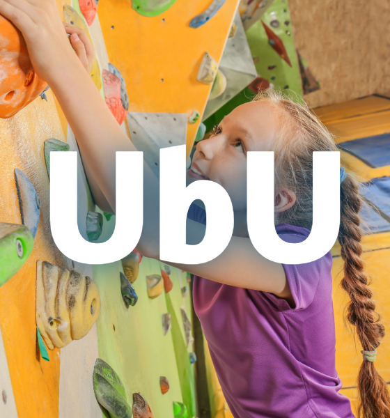 child climbing rock wall with text overlay