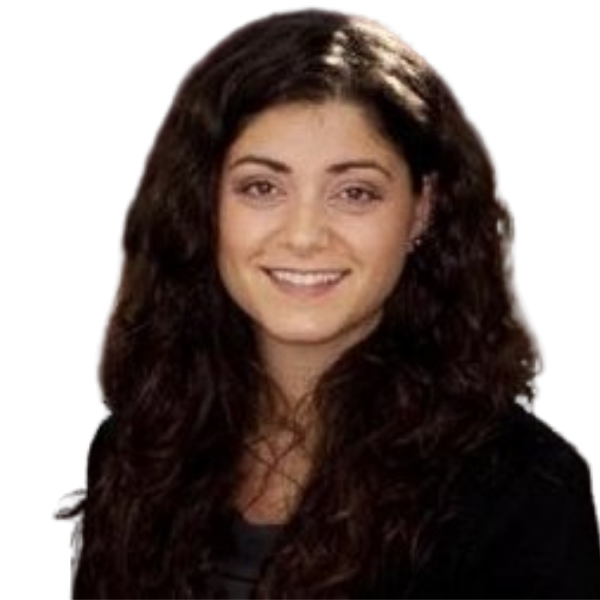 Portrait of a young woman with long, curly brown hair, smiling against a black background.