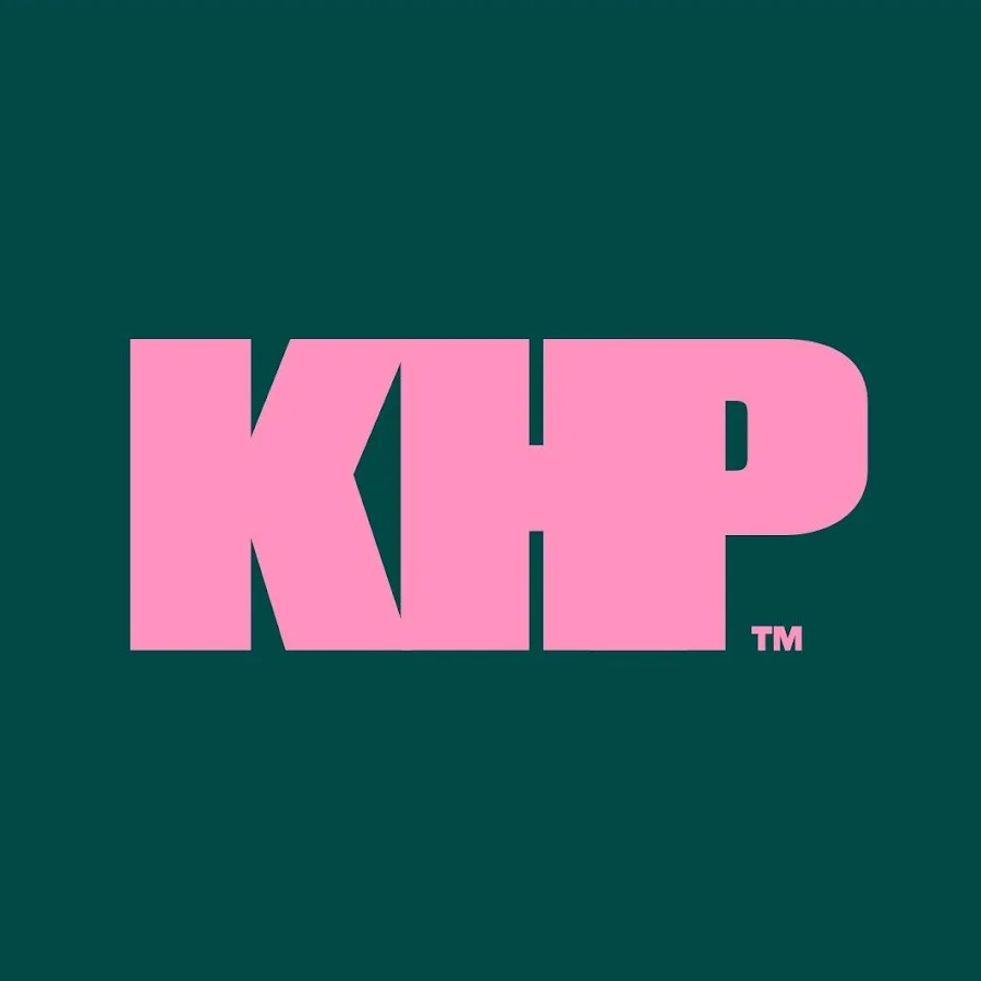 Pink logo with the letters 'KCP' on a teal background.