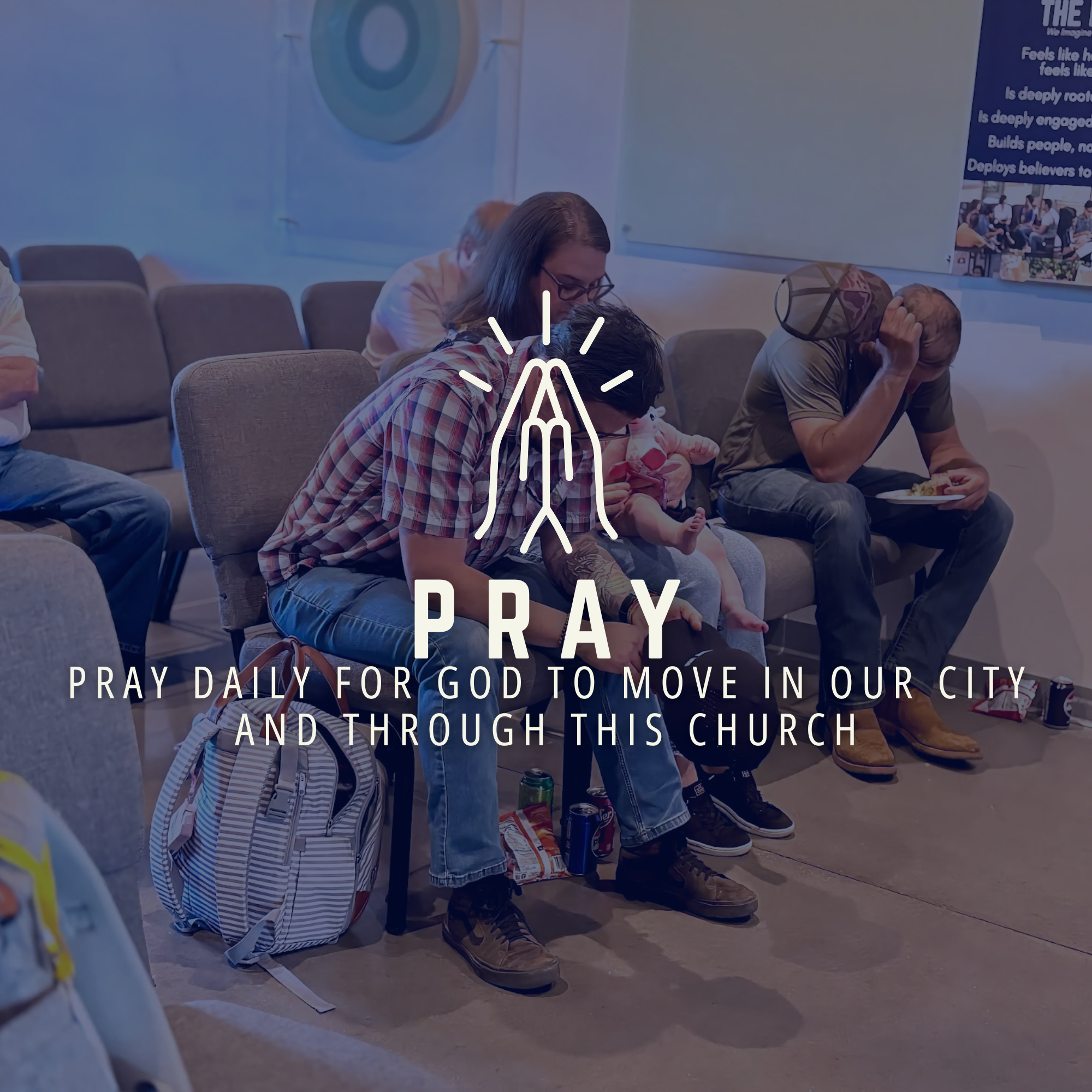 People kneeling and praying in a church, with some holding hands in prayer, while others are bowing or with heads bowed.
