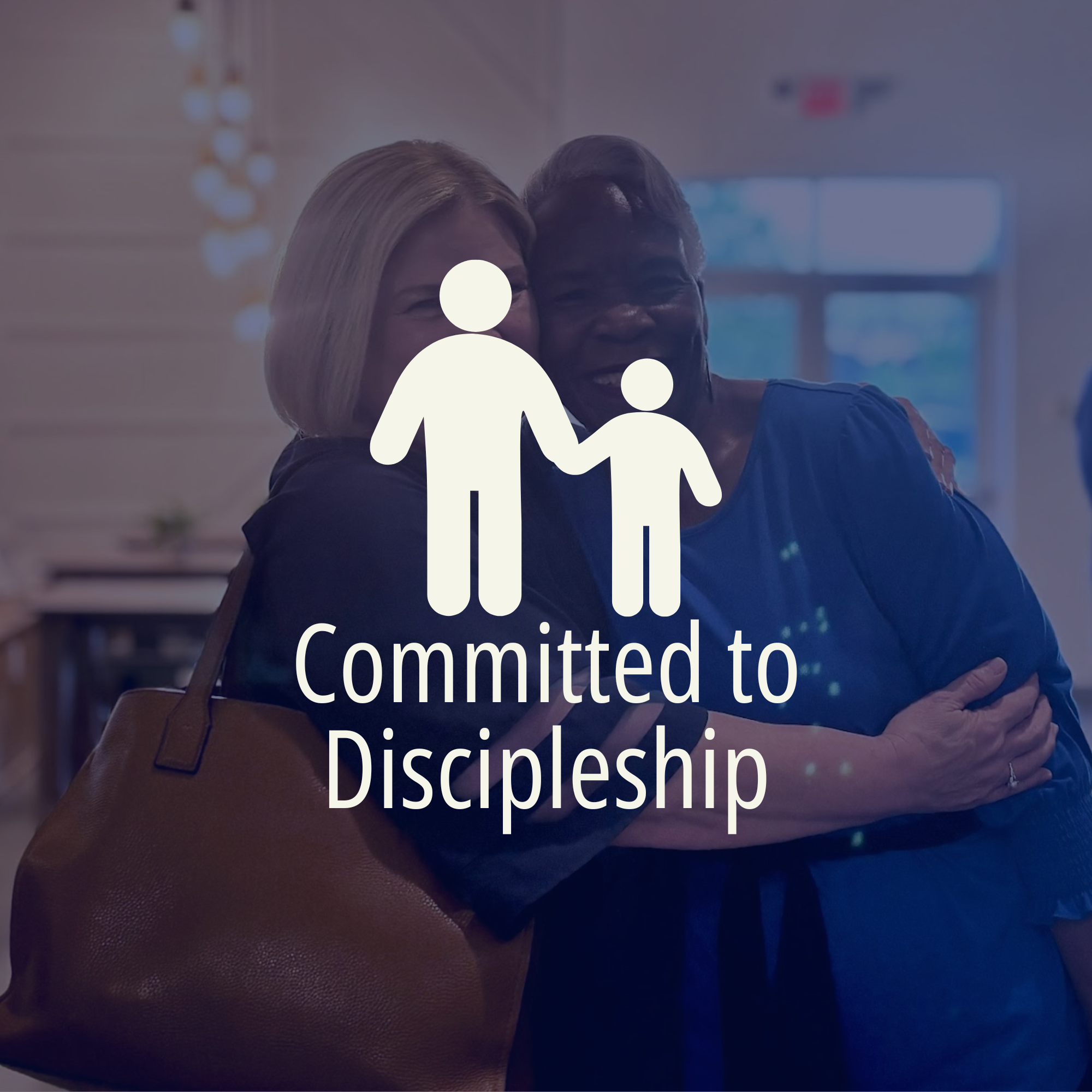 Two women hugging each other with a blurred background and an overlay of white text that says, "committed to Discipleship."