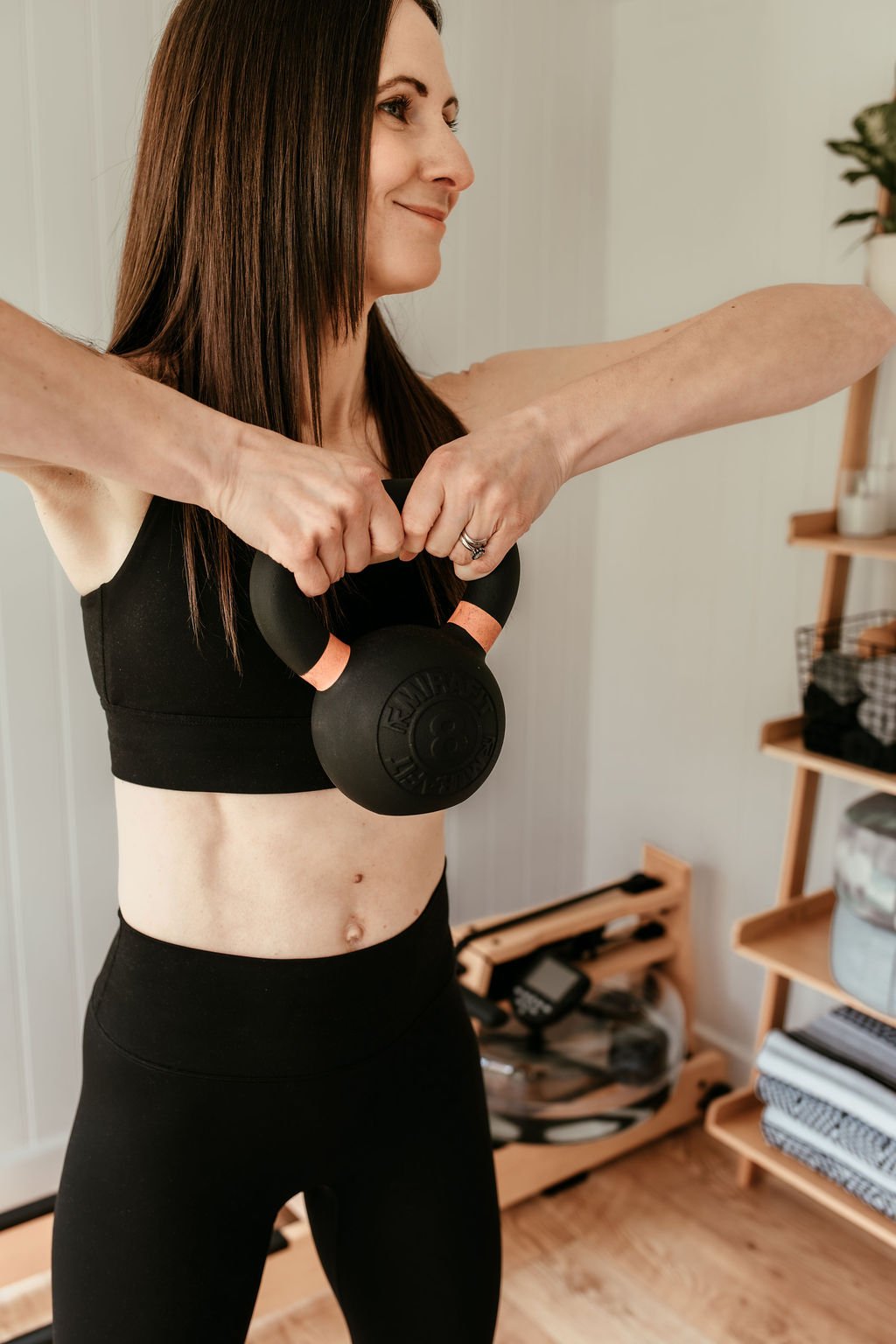 Female strength coach supporting women through pelvic floor recovery.