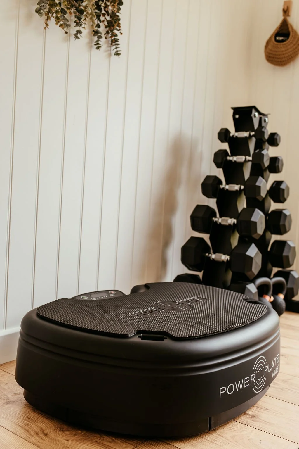 Private women's wellness studio with reformer and strength equipment.