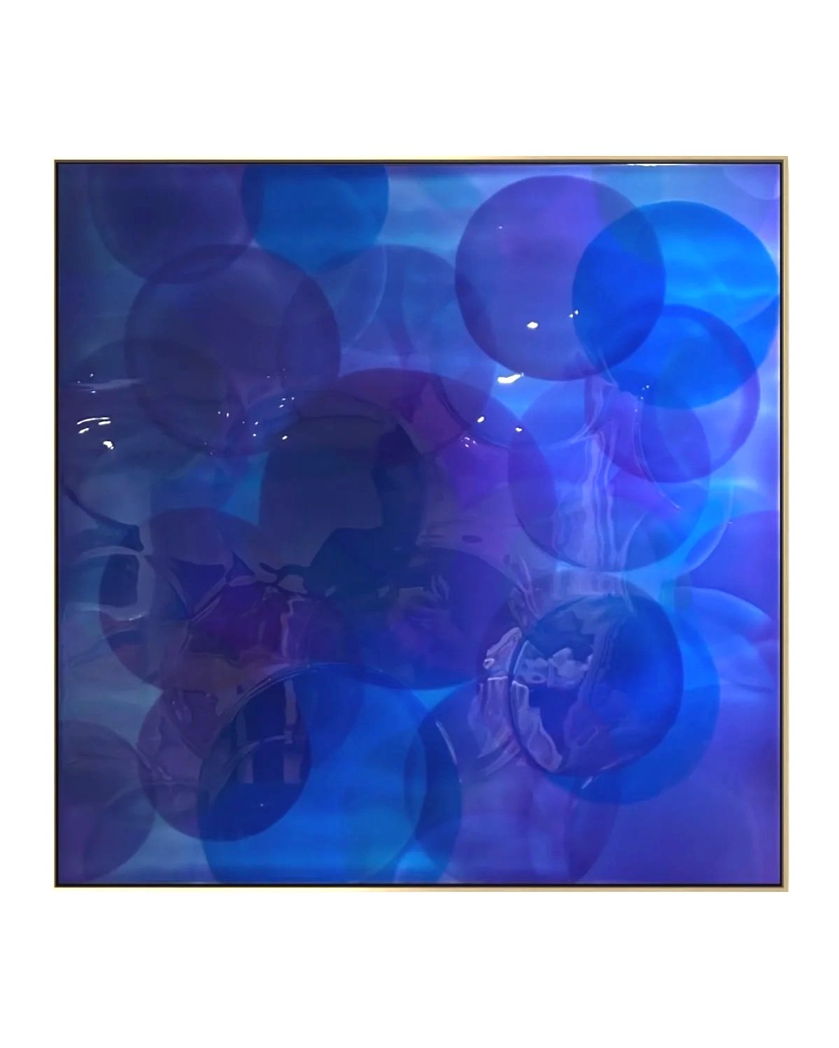Specular Blue - abstract blue resin artwork by Daria Baluta featuring layered, glossy textures encased in a sleek gold mirror frame.