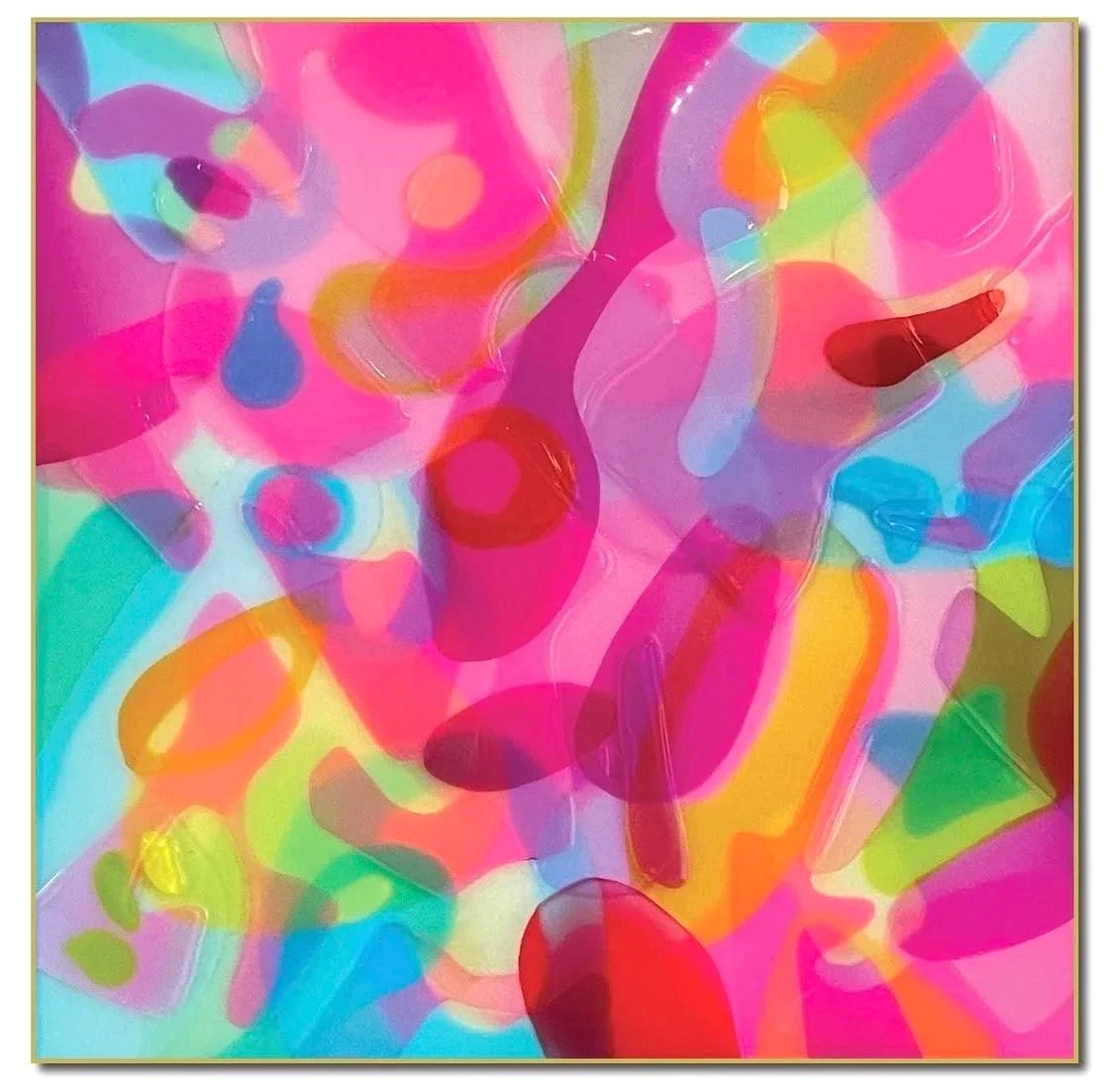 Colorful abstract artwork with overlapping pink, blue, yellow, green, and red shapes and highlights.