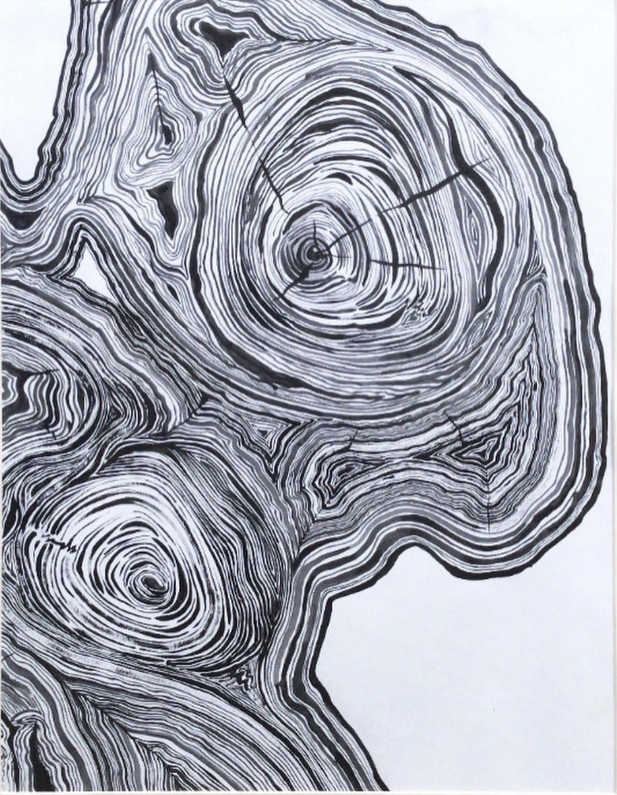 Black and white abstract artwork resembling a tree trunk cross-section with concentric rings and textured lines.