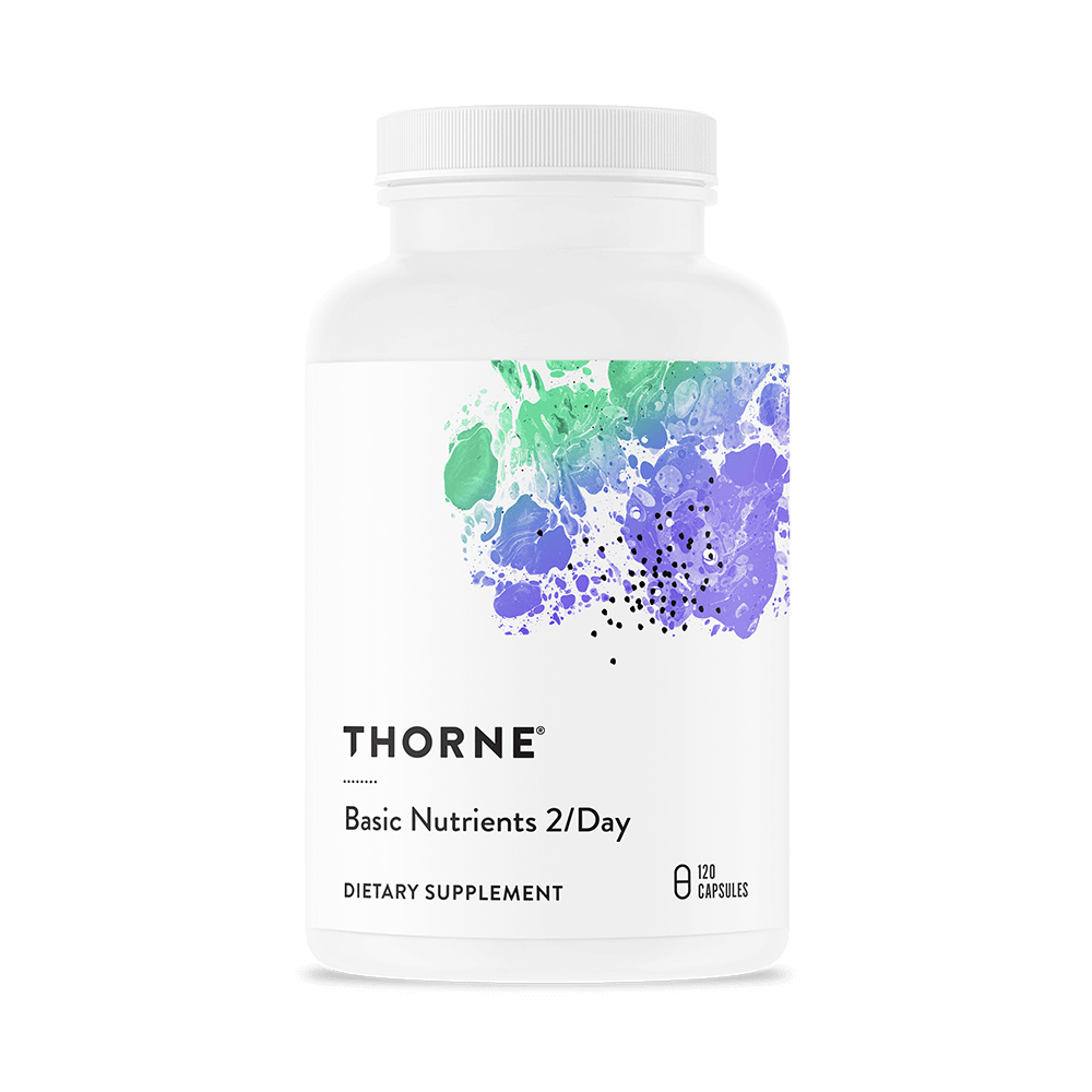Bottle of Thorne Basic Nutrients dietary supplement with colorful abstract artwork on the label.