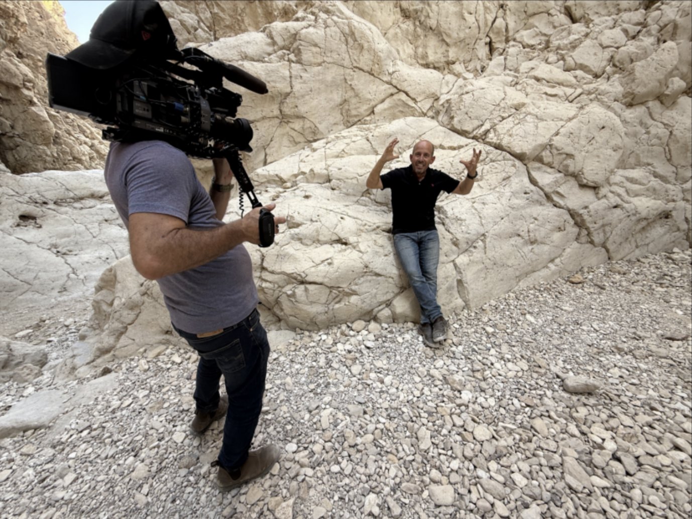 Amir Sheinbaum filming Erez Eshel on location in the Gaza envelope.