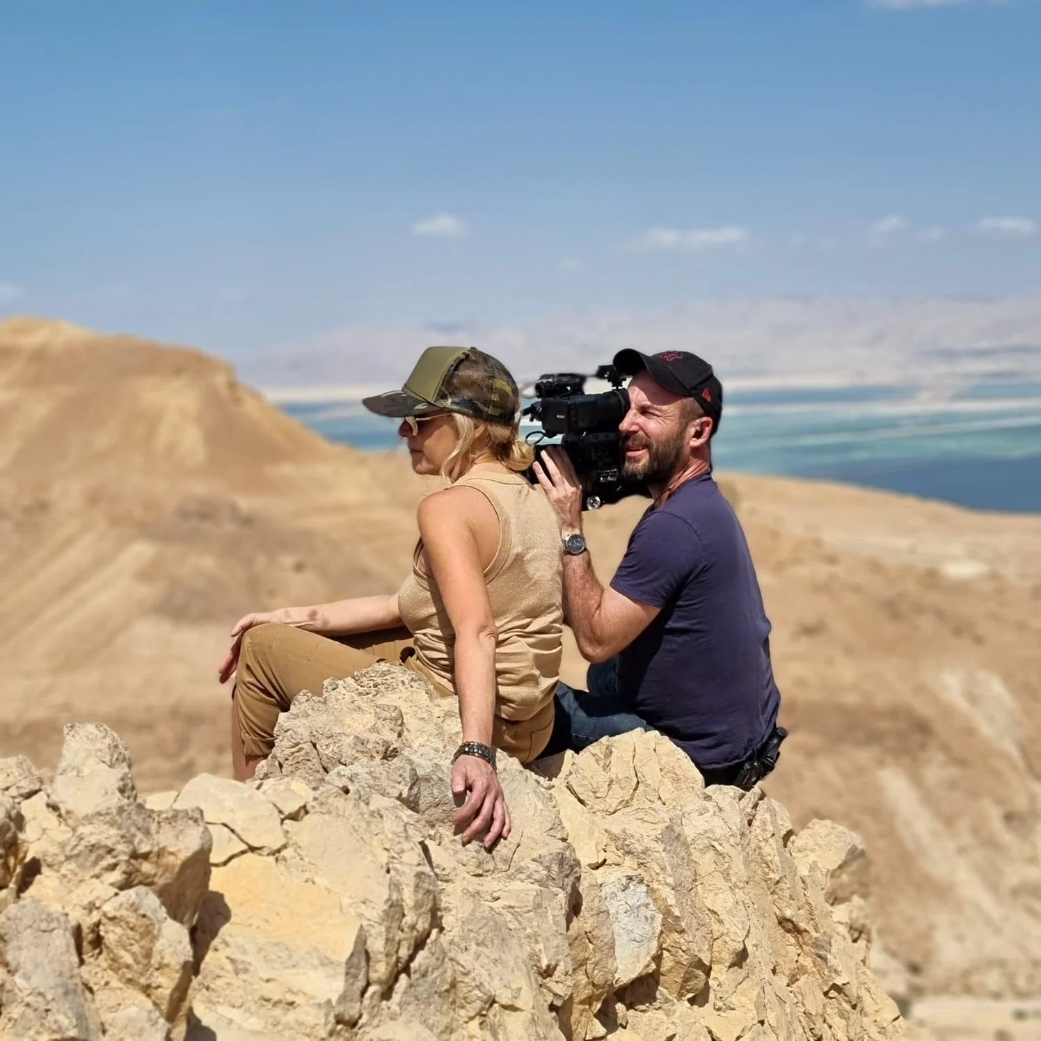 Melissa Francis and Amir Sheinbaum shooting The Prophet documentary above the Dead Sea.