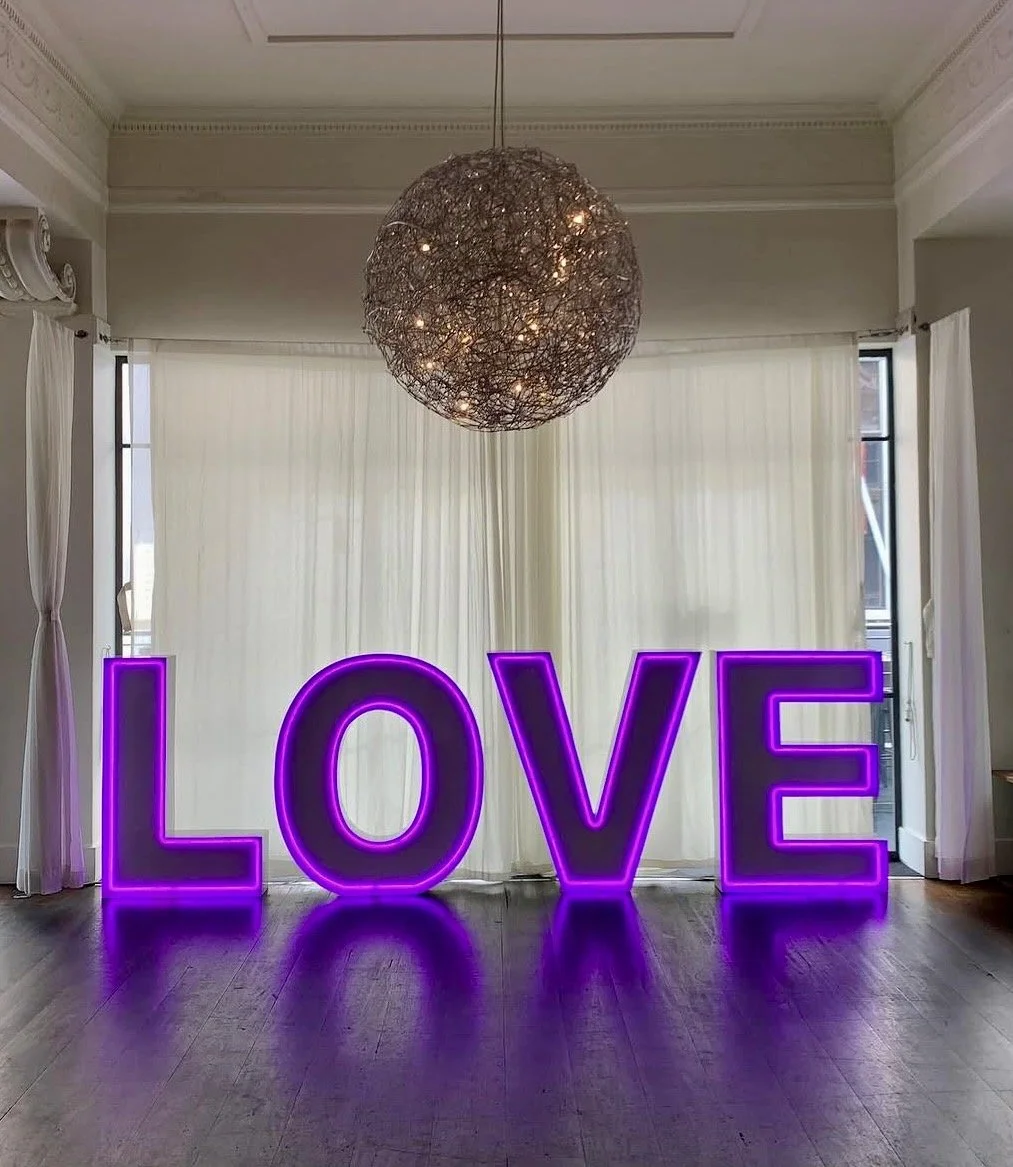 Decorative marquee LED lights spelling LOVE