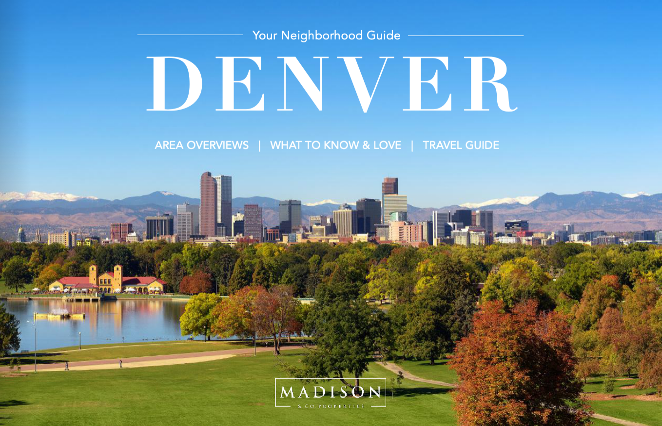 Cover image of a Denver neighborhood travel guide featuring a city skyline with red, beige, and gray skyscrapers, a large park with green trees and a water body, and snow-capped mountains in the background. The guide is titled "Your Neighborhood Guide Denver" and includes sections for area overviews, what to know and love, and travel tips, published by Madison & Co Properties.