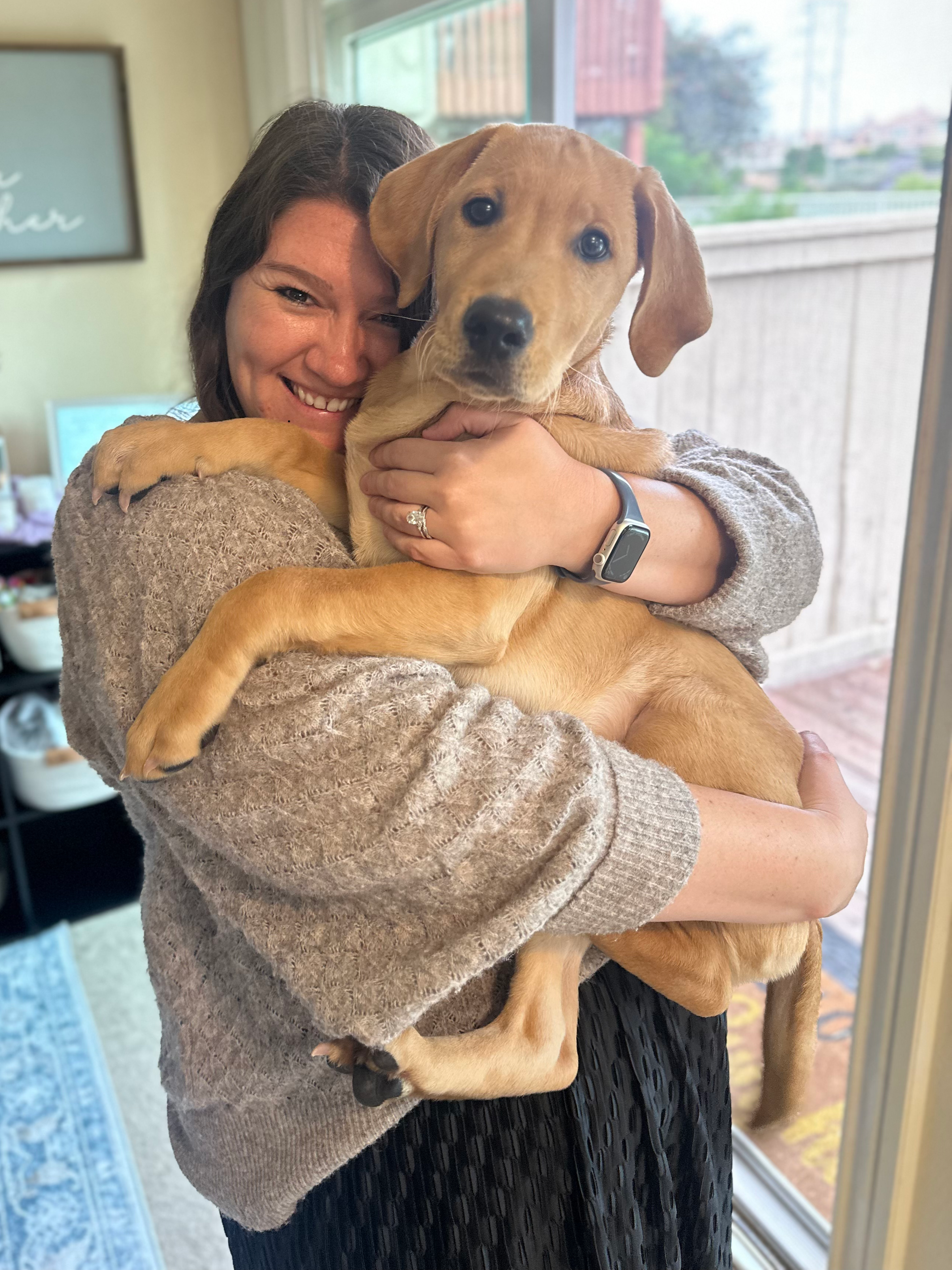 Dr. Kayla Clark enjoying time with her dog outside of work.