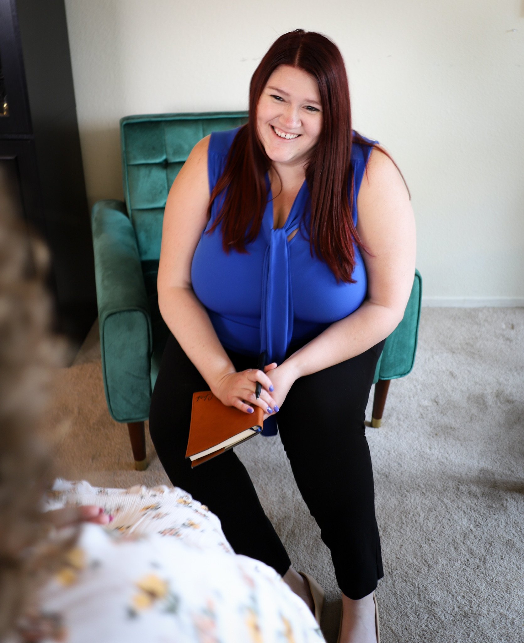 Therapist providing compassionate, evidence-based care during a therapy session.