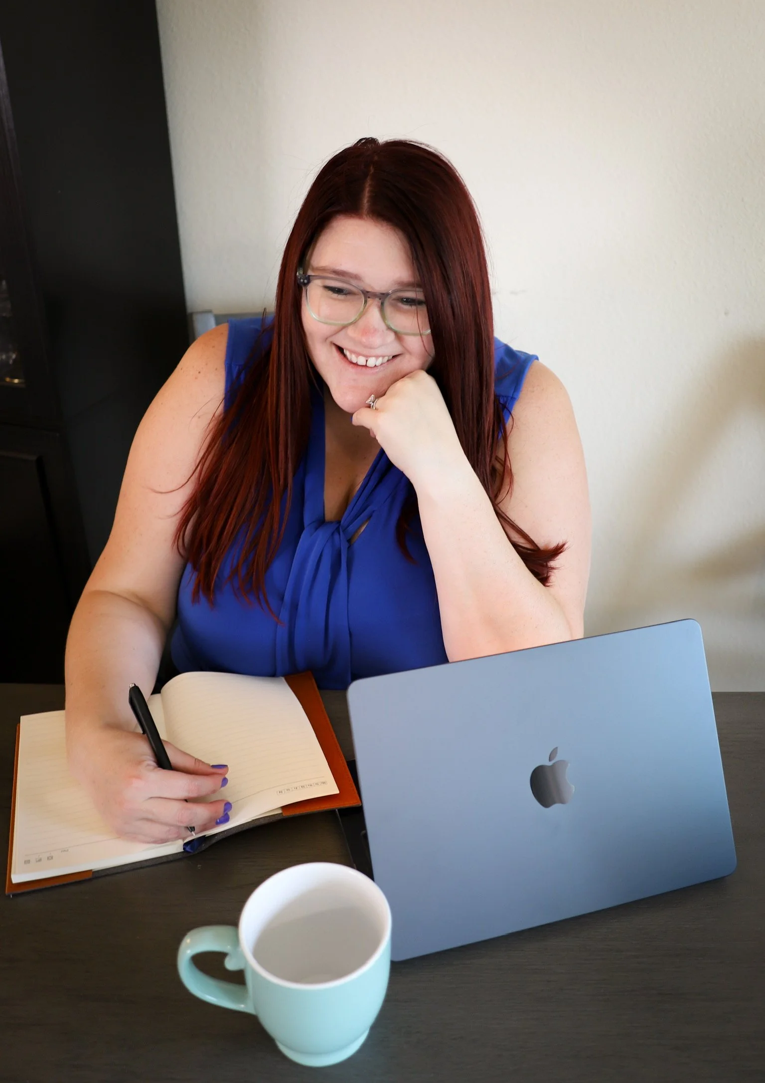 Therapist documenting session notes while providing evidence-based care.