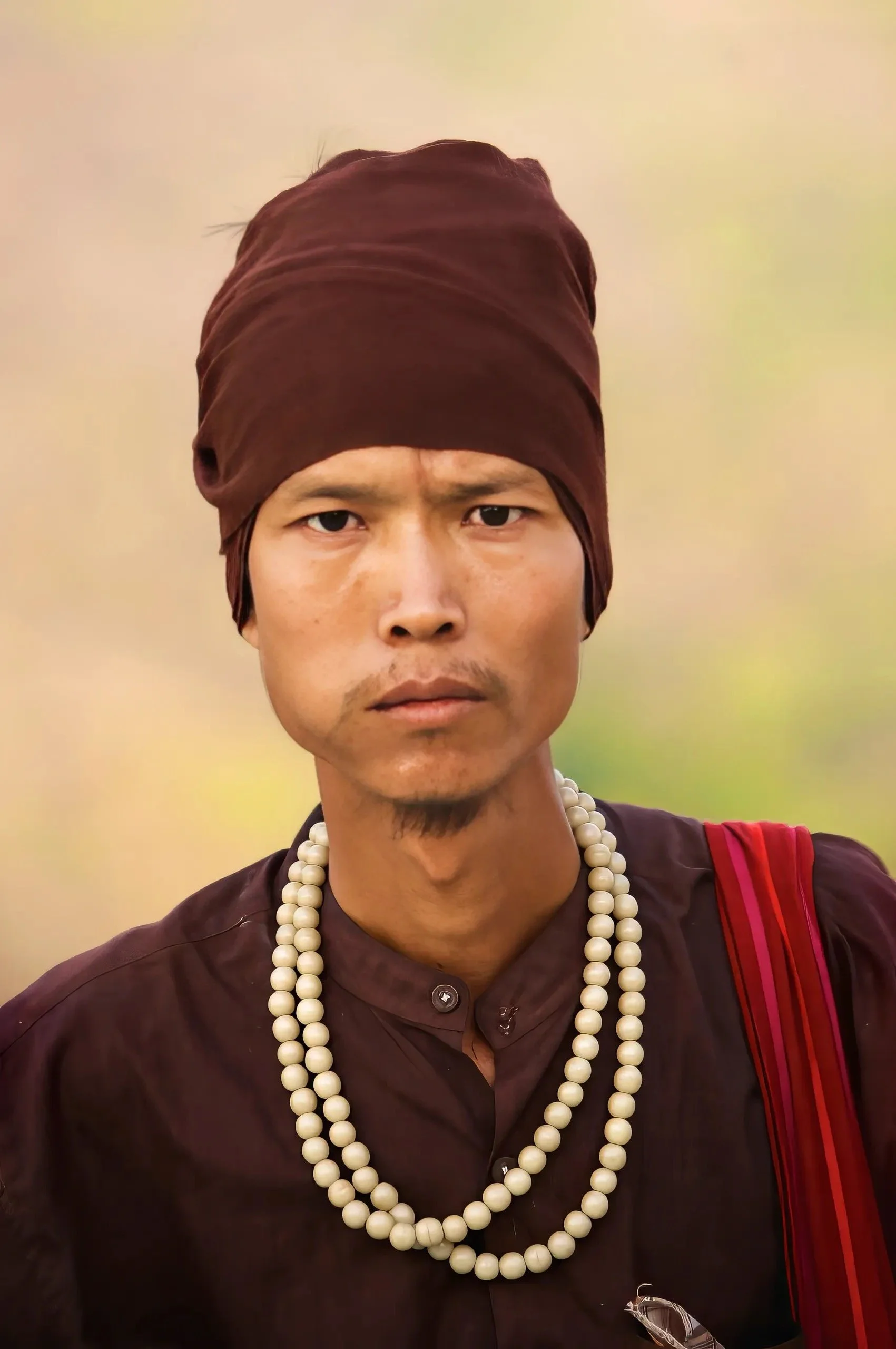 No smile.   All presence.  Myanmar