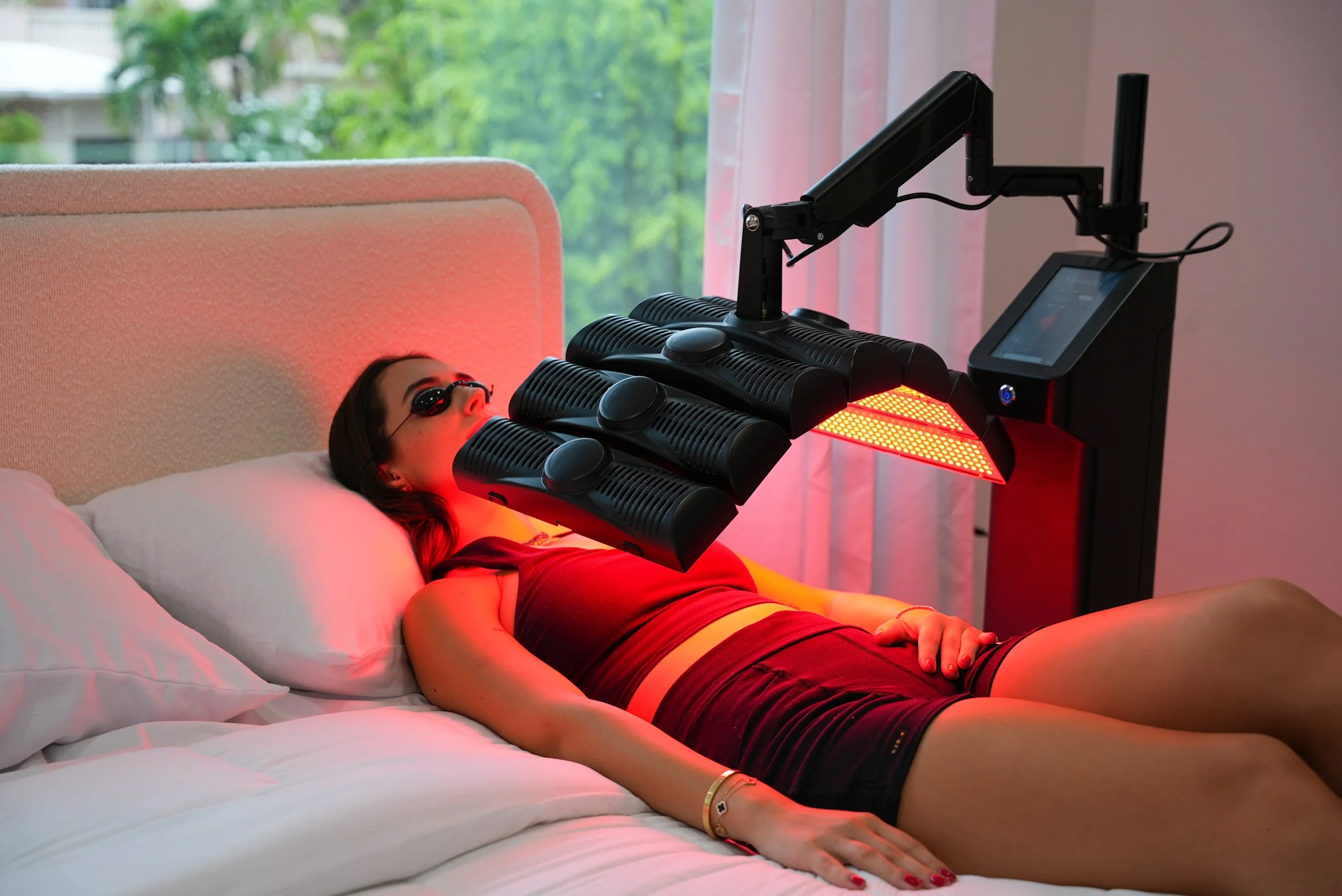 Umbrella Red Light on Abdomen Laying in Bed.jpg