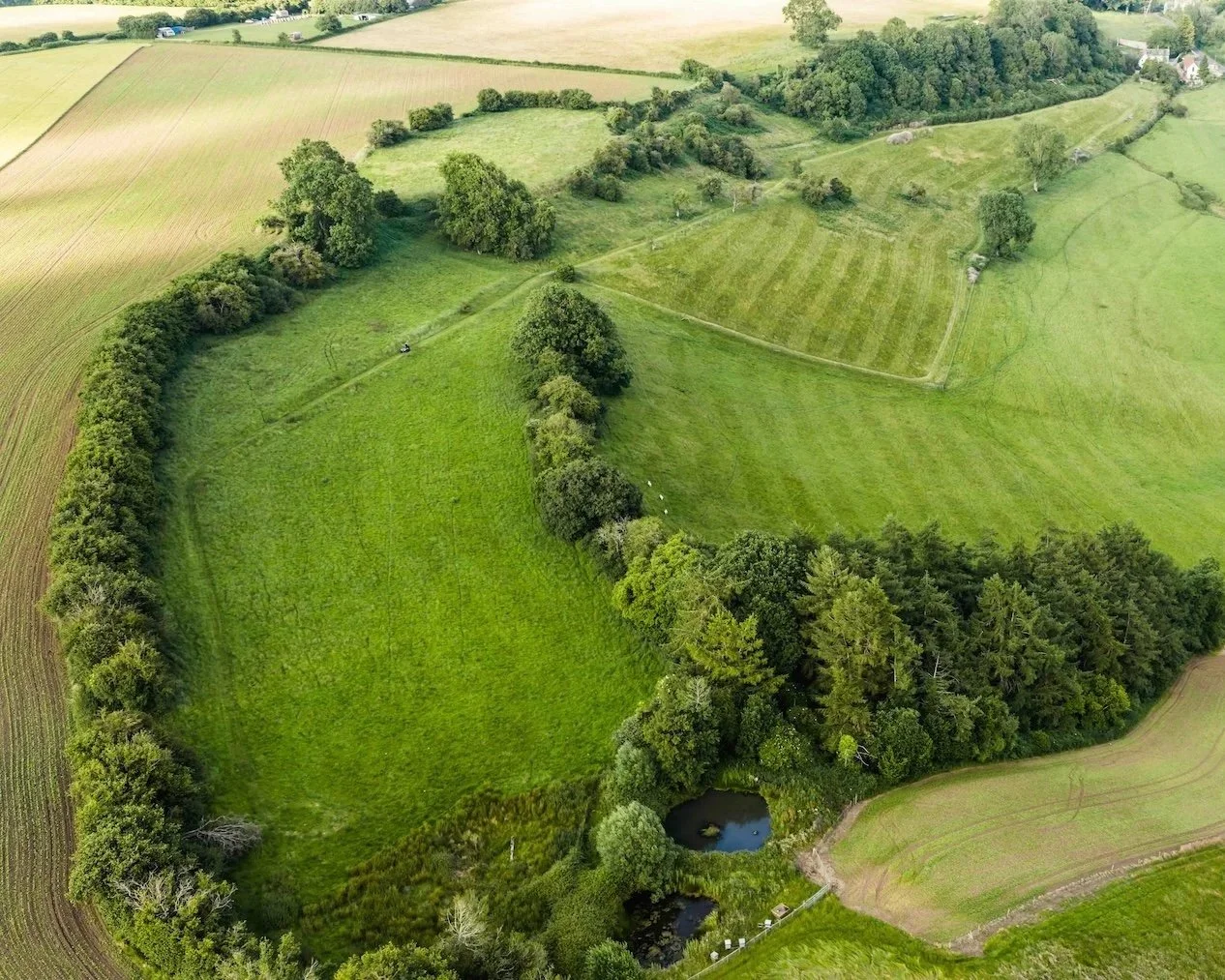 Elevated aerial view of the High Meadow and surrounding landscape at From Stone To Sky in the Wye Valley.