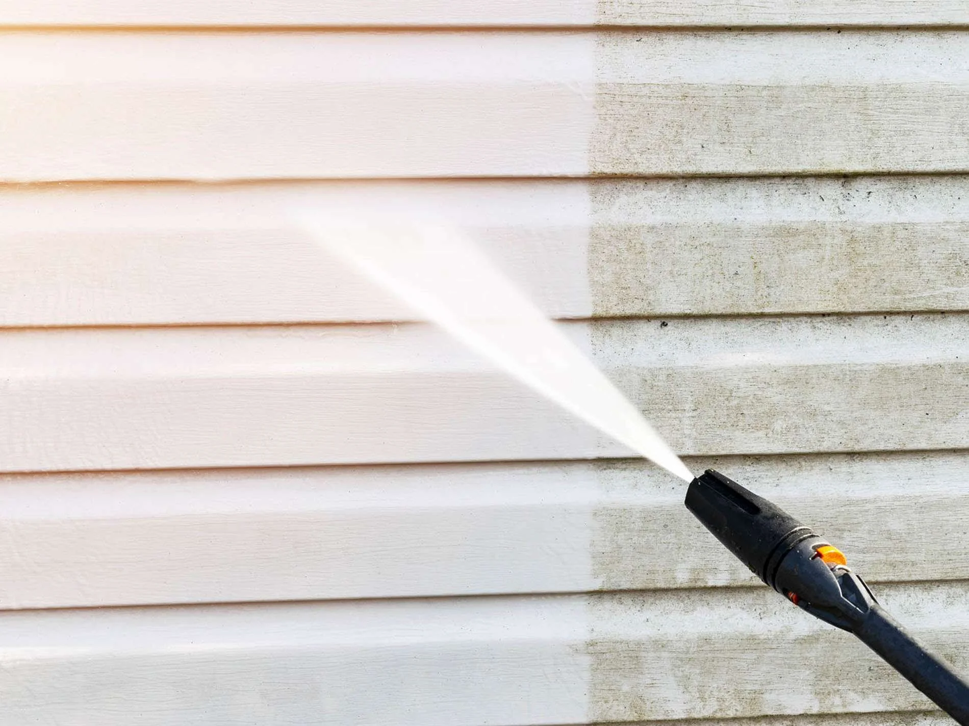 close up of exterior home maintenance pressure washing in christchurch