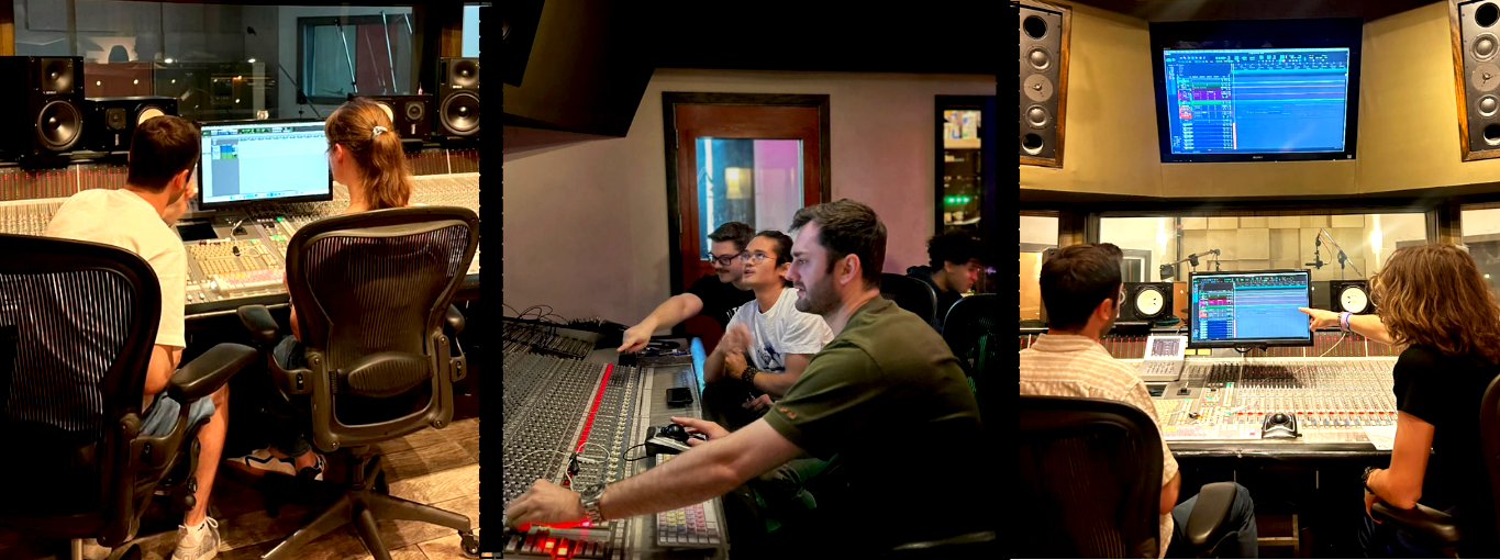 People working in a professional recording studio with large mixing consoles, speakers, and monitors.