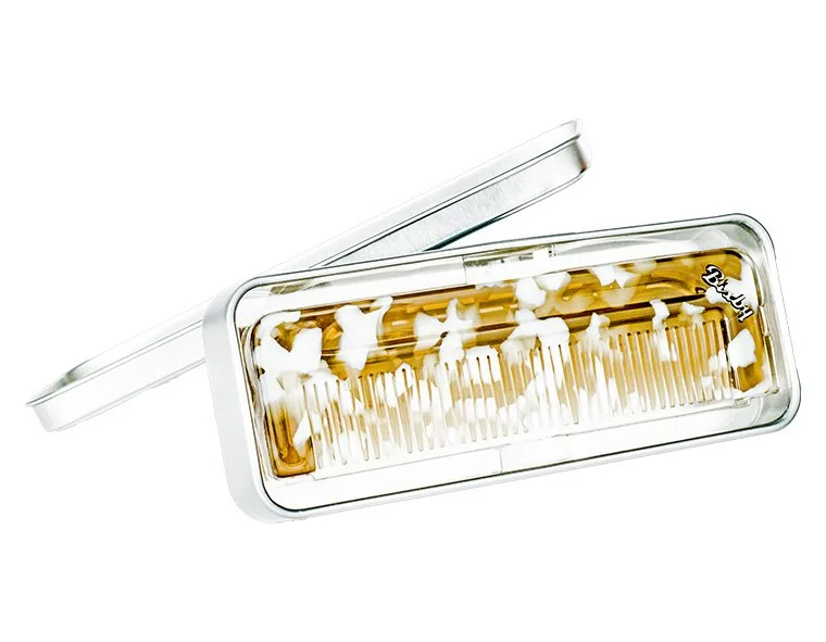 Bixby Fine Tooth Comb handcrafted from Italian acetate with signature metal inlay.