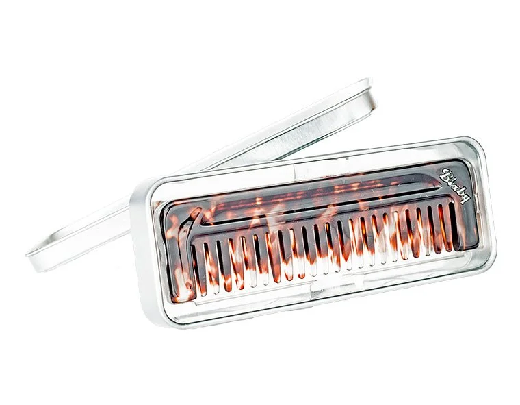 Bixby Wide Tooth Comb handcrafted from Italian acetate with signature metal inlay.