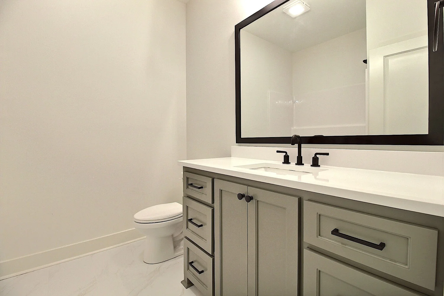 Custom cabinetry and interior finishes in the Burlington Lakes home