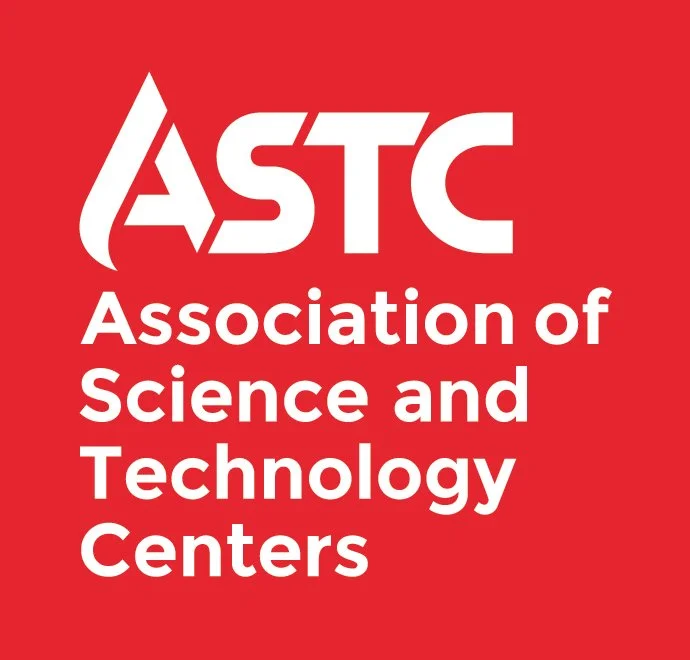 Red background with white text displaying the logo of the Association of Science and Technology Centers (ASTC).