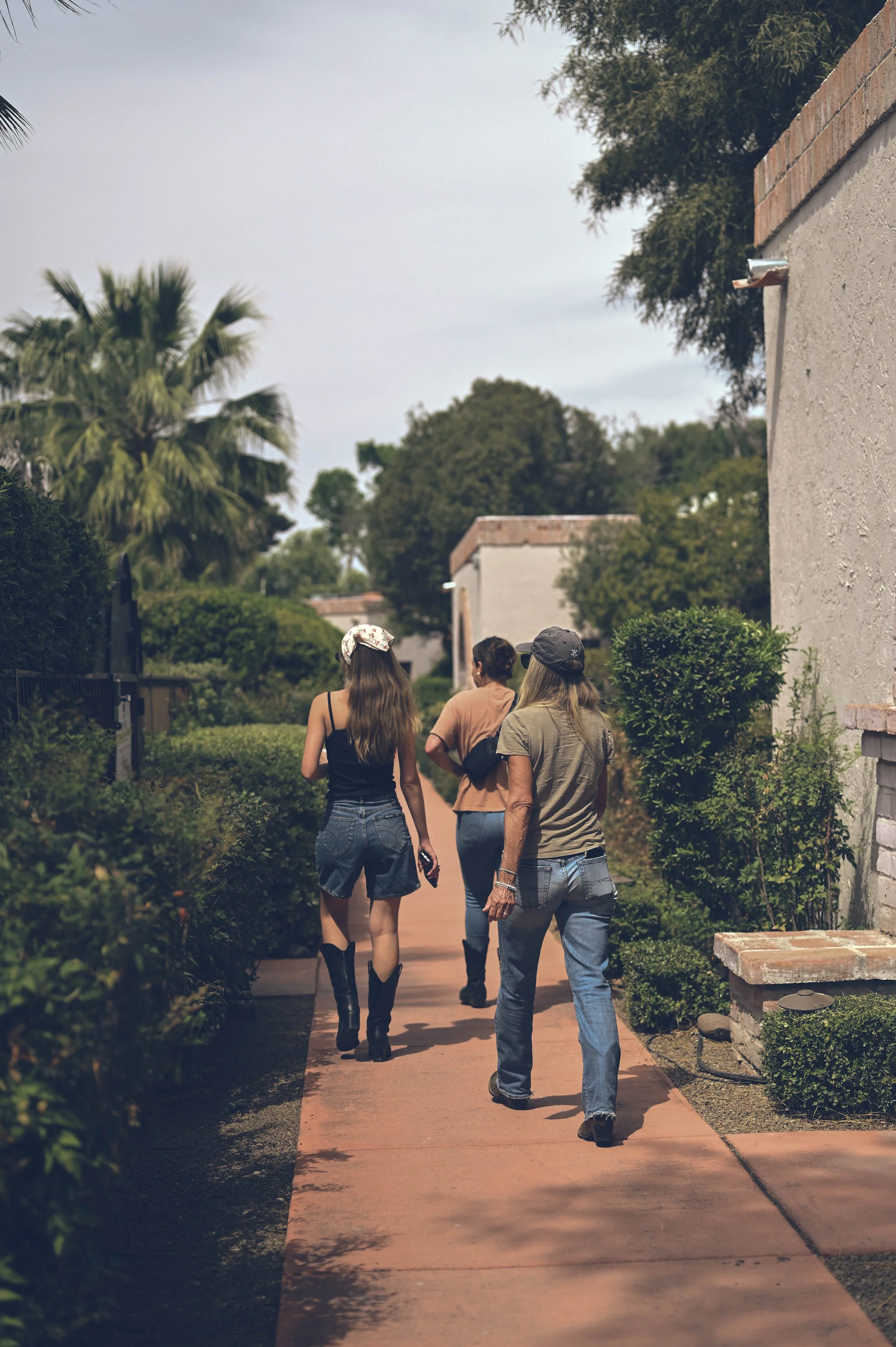 Otero Ranch guests walk back to their rooms on a dude ranch vacation.