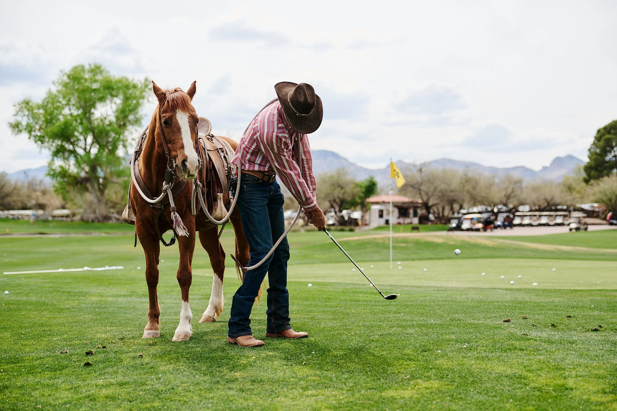 A dude ranch vacation guest on the golf course at Tubac Golf Resort. 