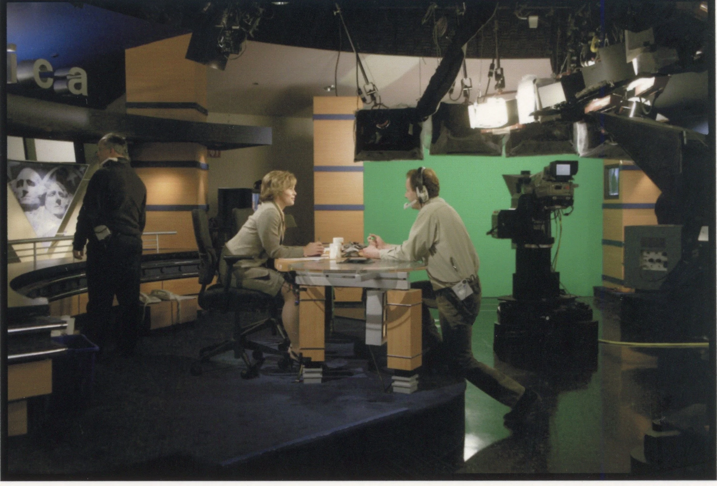 THE WEATHERMAN - At the “Hello, America!” News Anchor desk w/Crew