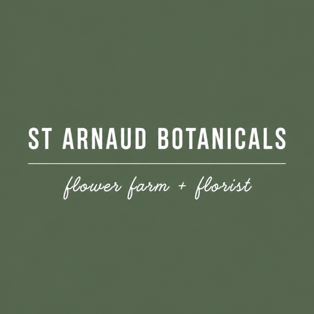 Sign for St Arnaud Botanicals, a flower farm and florist, on a green background.