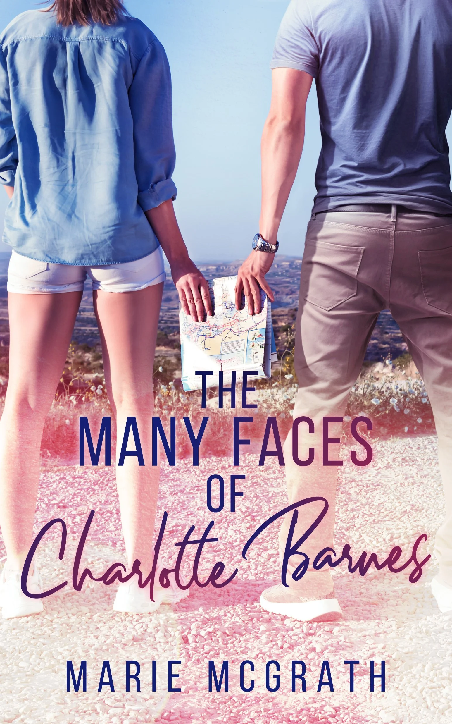 Two people holding hands, standing on a rocky landscape with a scenic view. One person is wearing a blue shirt and shorts, the other is wearing a gray t-shirt and beige pants. The image is the cover of a book titled 'The Many Faces of Charlotte Barnes' by Marie McGrath.